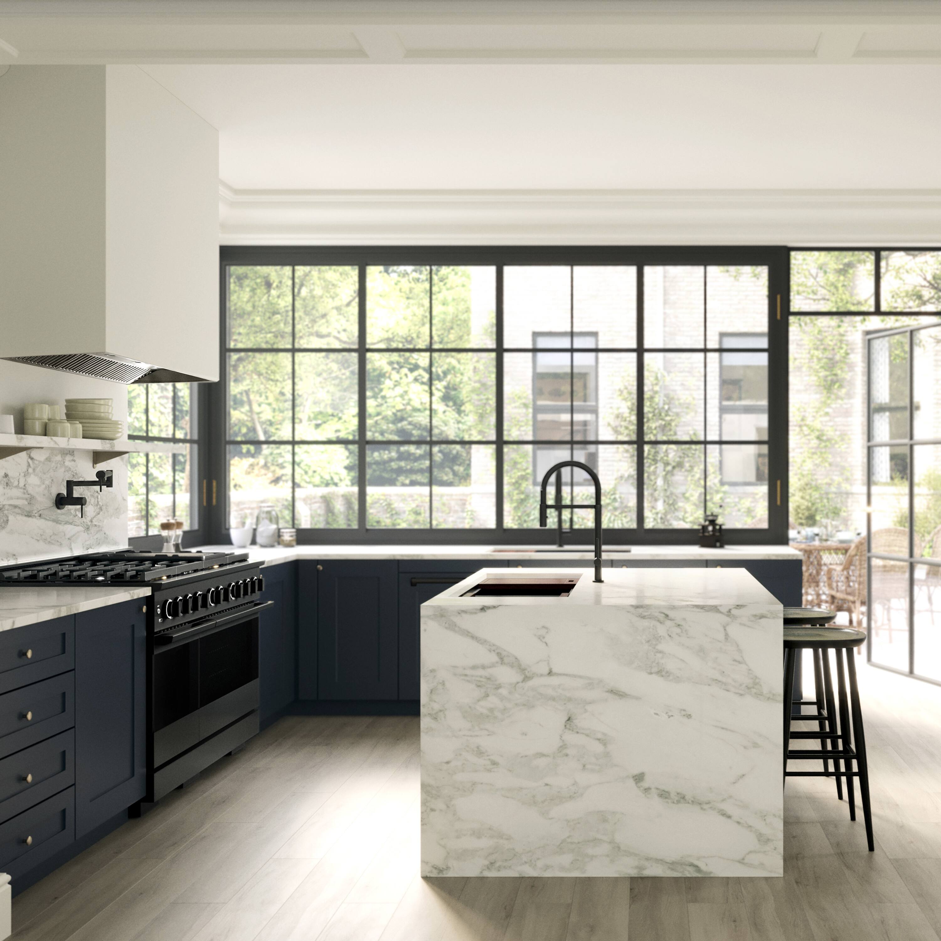 a contemporary kitchen with a marble island