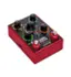 The image features a red pedalboard with various knobs and switches, including a tuner, delay, and reverb. The pedalboard is designed to enhance the sound of a guitar, offering a range of effects and settings to suit different playing styles and preferences. The knobs and switches are arranged in a way that allows the user to easily access and control the different effects, making it a versatile and user-friendly tool for musicians.