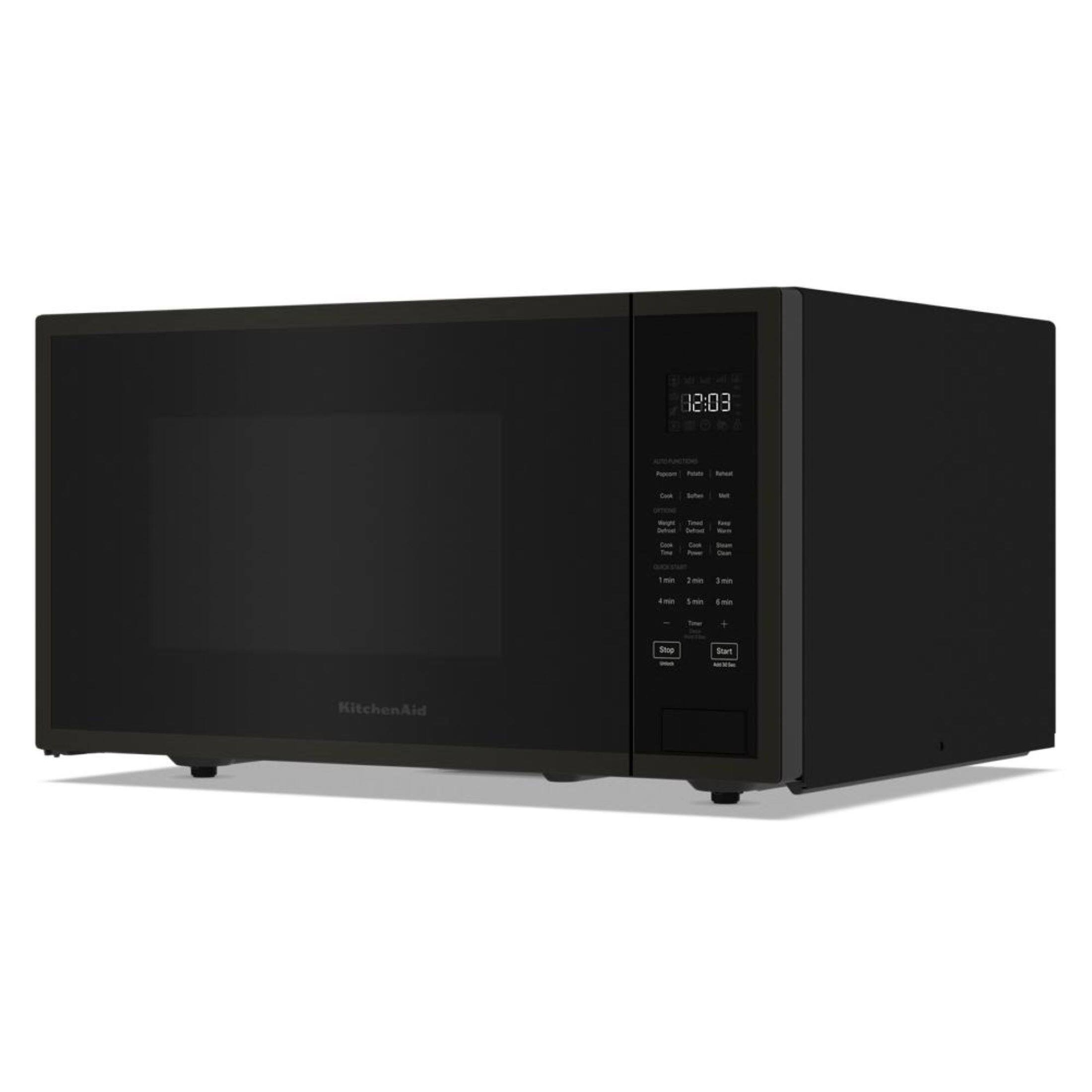 The microwave is a Sharp KitchenAid model, and it is set to 2:03.