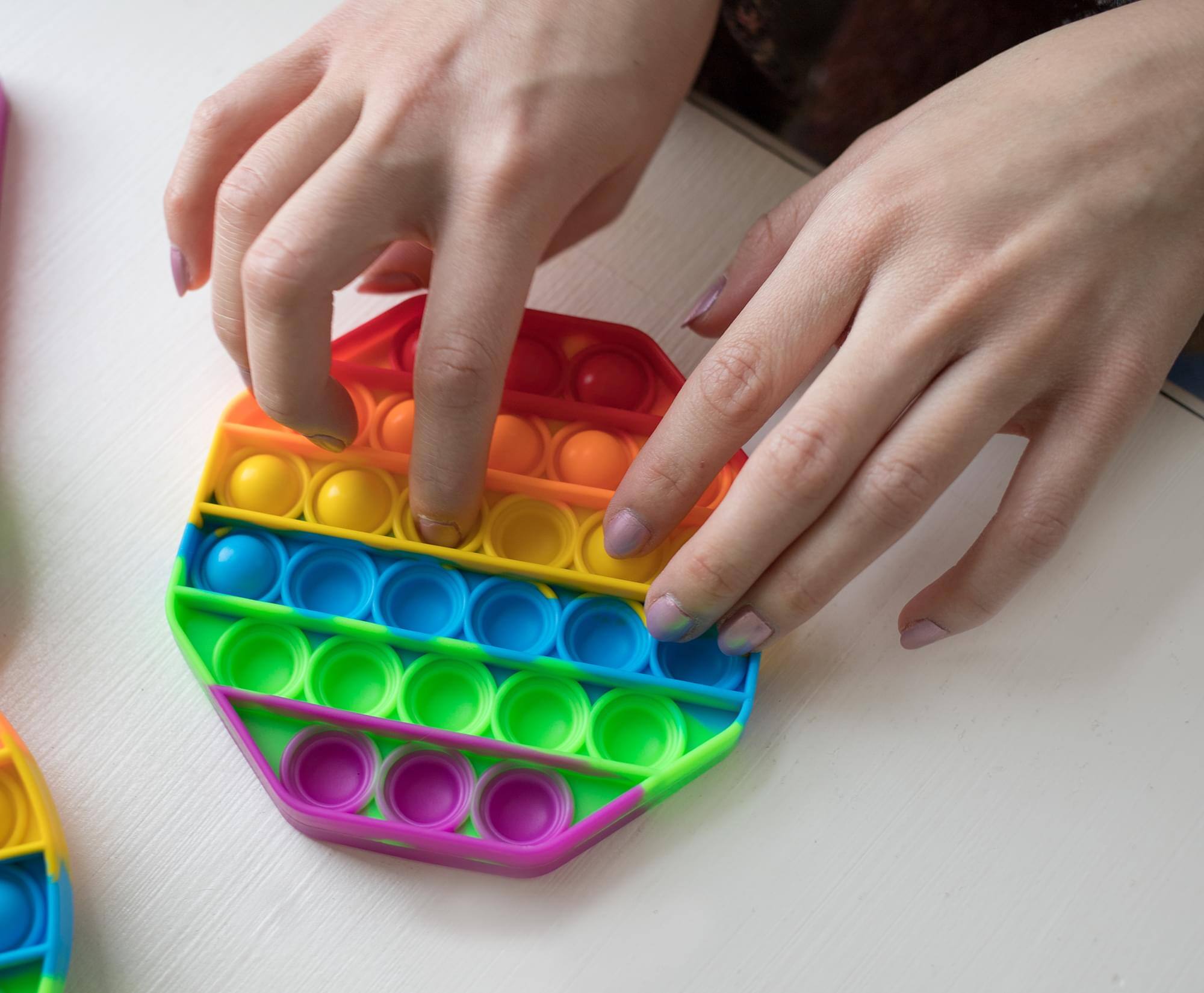 Alt View 2. Toynk - Pop Fidget Toy Silicone Bubble Popping Game | Rainbow Octagon - Multi-Color.