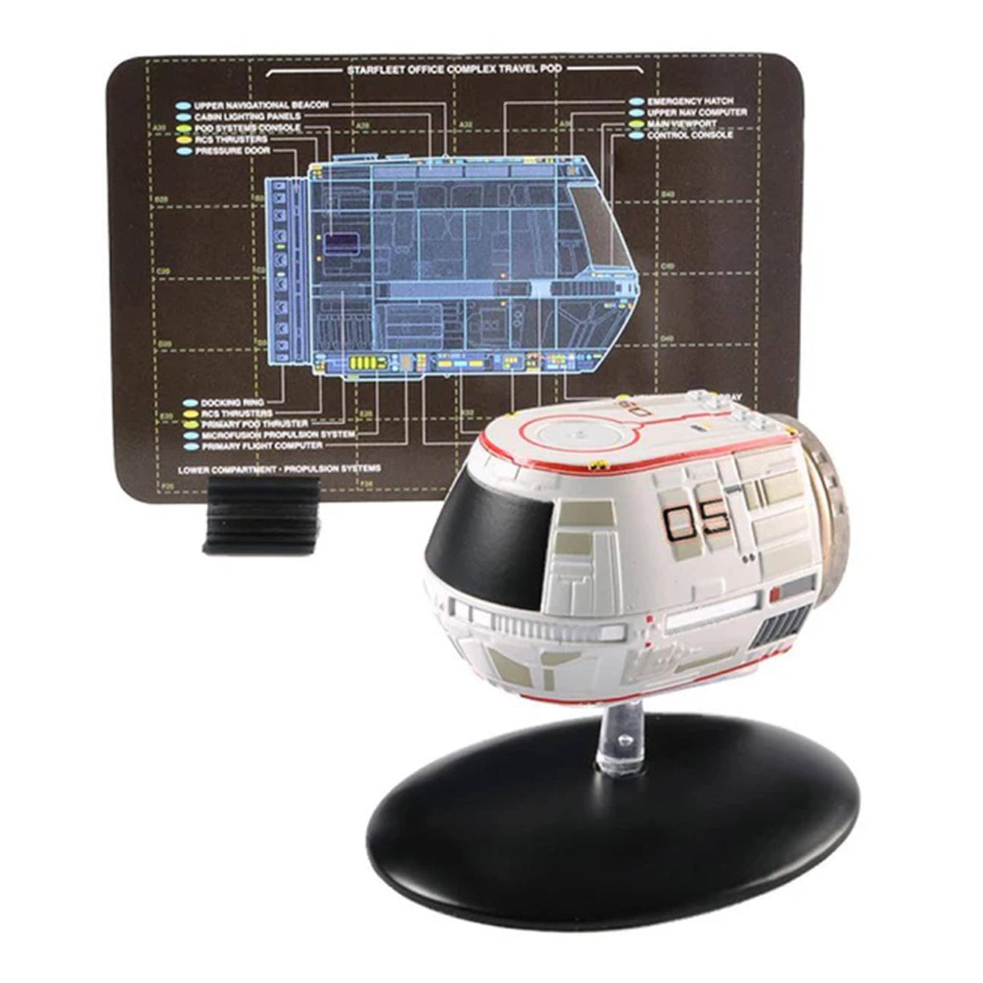 STARFLEET OFFICE COMPLEX TRAVEL POD  
UPPER NAVIGATIONAL BEACON  
CABIN LIGHTING PANELS  
POO SYSTEMS CONSOLE  
ACS THRUSTER  
PRESSURE DOOR  
EMERGENCY MATCH  
UPPER NAV COMPUTER  
MANVIEWPORT  
CONTROL CONSOLE  
-2 E - 1IE E.  
DOCKING -NO  
ACS THRUSTERS  
PRARTPOO THRUSTER  
MICROPROPULSION SYSTEM  
PRIMARY FLIGHT COMPUTER  
LOWER COMPARTMENT  
PROPULSION SYSTEMS