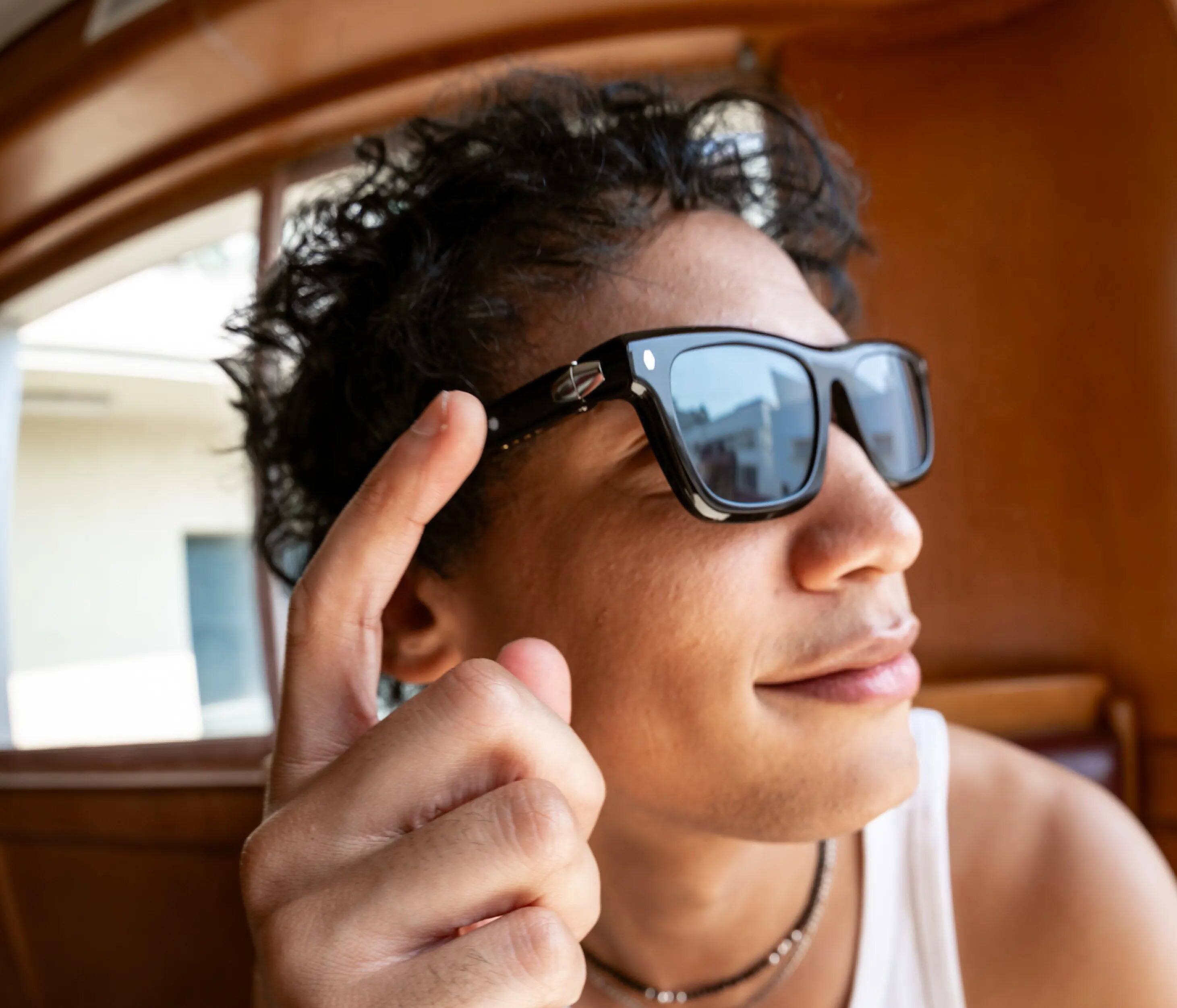 Alt View 2. Chamelo - Lion City Audio Sunglasses with Instant Adjustable Tint - Glossy Black.