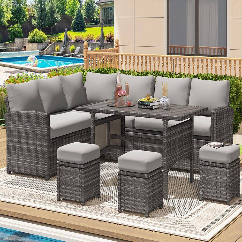 Left. Mondawe - 7-Piece Dining Set with Fireproof Plastic Wood Frame and Cushions - Grey.