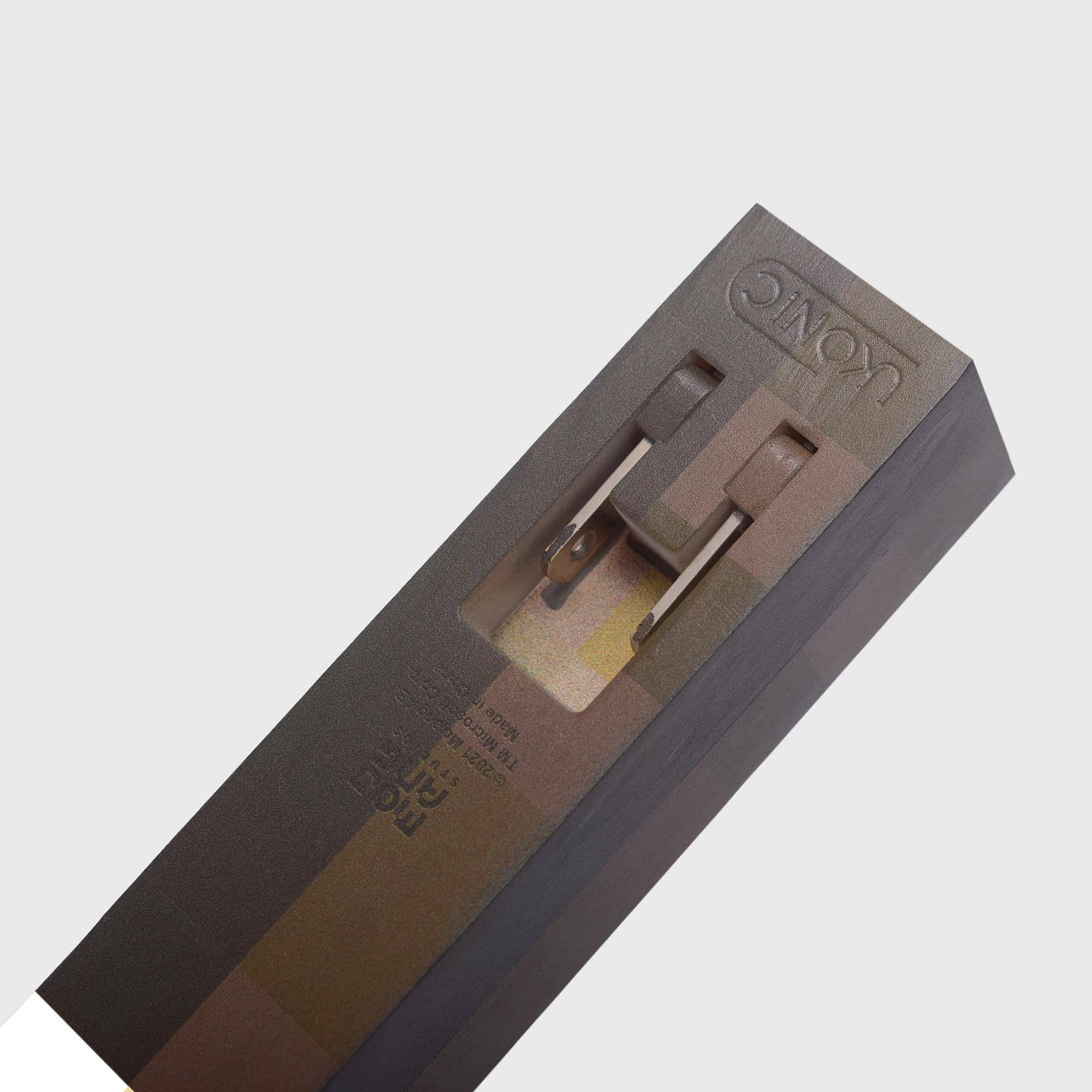 The text on the image reads:

"UKONIC  
0eow 60e Micro Made 50 Mc STU 62021 TM noW ANG 60"