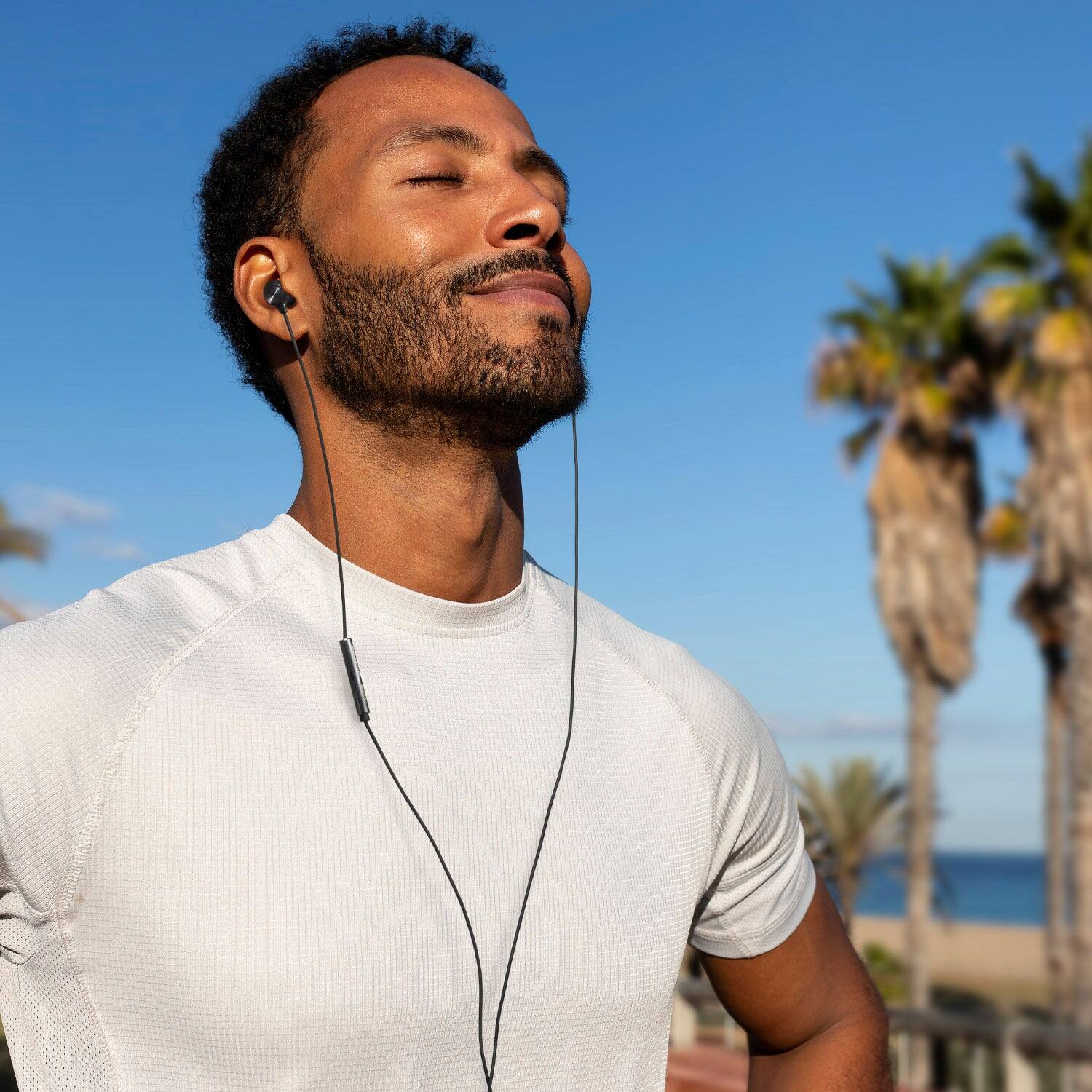 Angle. Panasonic - ErgoFit In-Ear Earbud Headphones with Microphone, USB-C Compatible - Blue.