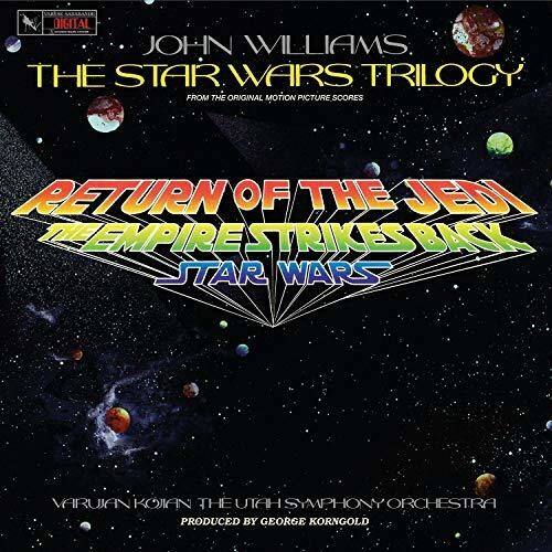 JOHN WILLIAMS  
THE STAR WARS TRILOGY  
FROM THE ORIGINAL MOTION PICTURE SCORES  

RETURN OF THE JEDI  
EMPIRE STRIKES BACK  
STAR WARS  

VARUJAN KOJAN  
THE UTAH SYMPHONY ORCHESTRA  
PRODUCED BY GEORGE KORNGOLD