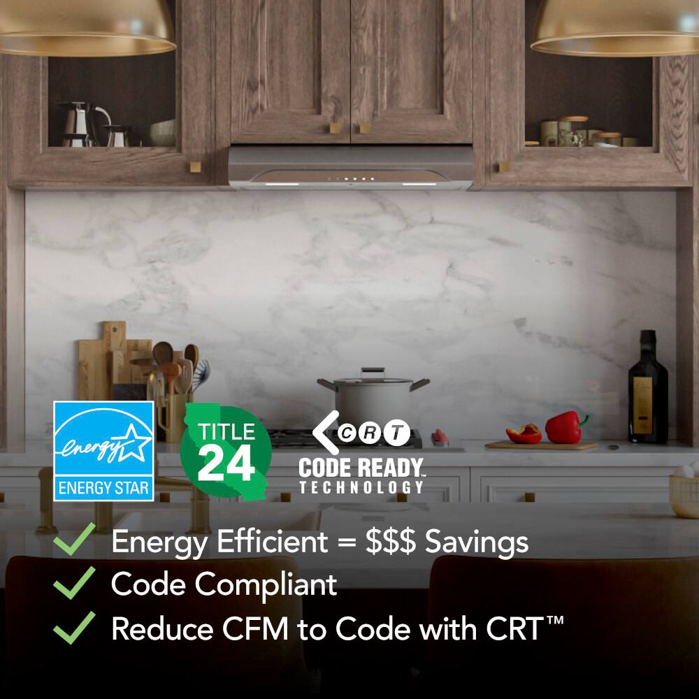 The image features a kitchen with a stove and a counter. The text on the image reads "Energy Efficient = $$$ Savings Code Compliant TM Reduce CFM to Code with CRTM." This text suggests that the kitchen is designed with energy efficiency in mind, potentially reducing energy consumption and costs. The kitchen also appears to be code compliant, ensuring that it meets safety and building standards.