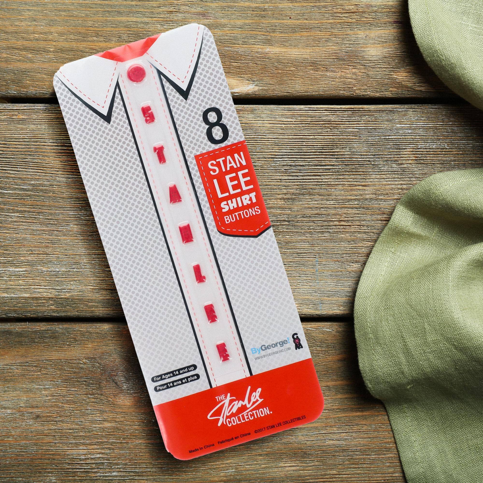 8 STAN LEE SHIRT BUTTONS  
By George!  
WWW.BYGEORGEINC.COM  
For Ages 14 and up  
Pour 14 ans et plus  
THE STAN LEE COLLECTION  
Made in China  
Fabriqué au Chine