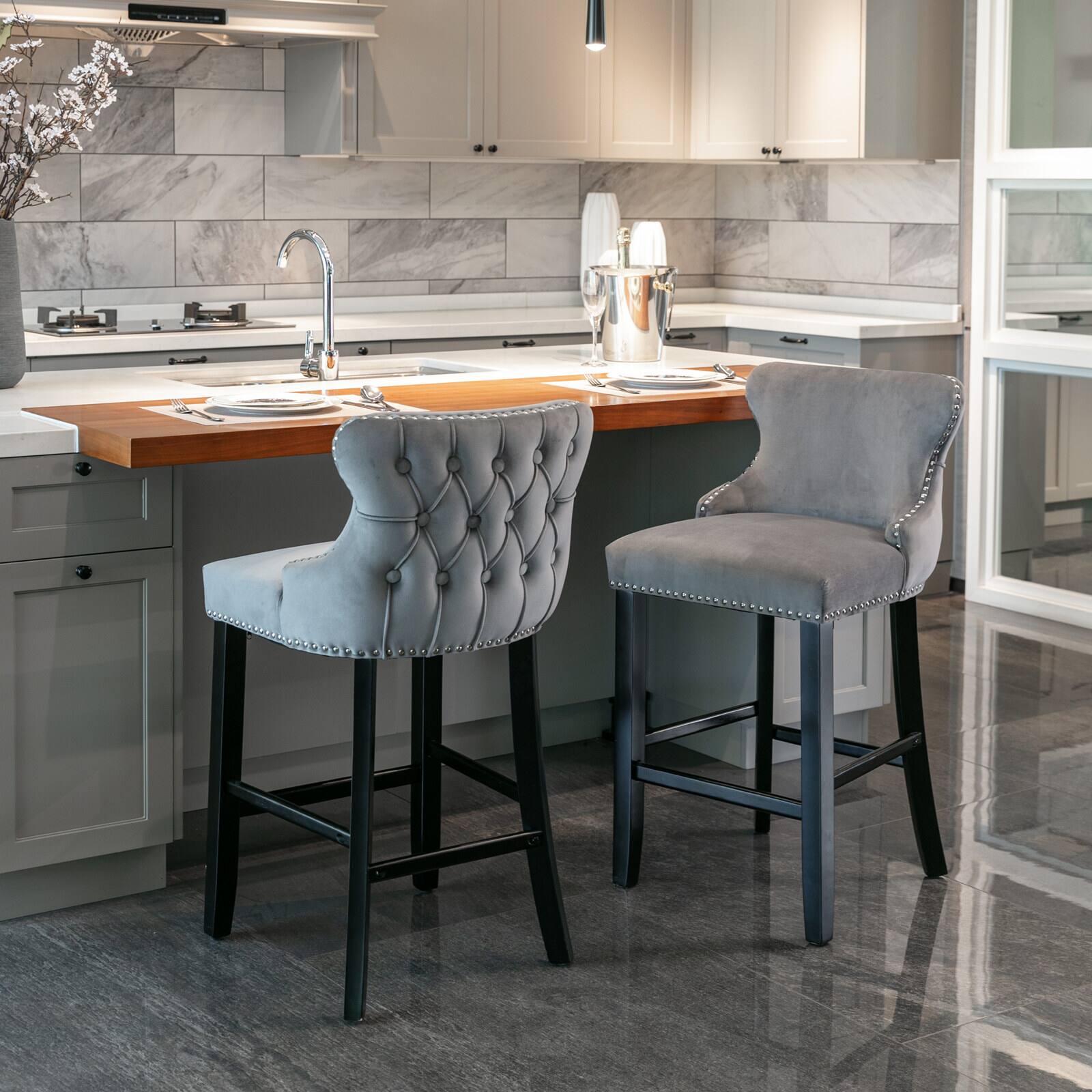 Left. SlickBlue - Upholstered Wingback Barstools Button-Tufted Counter Chairs with Wooden Legs for Kitchen & Bar - Grey.