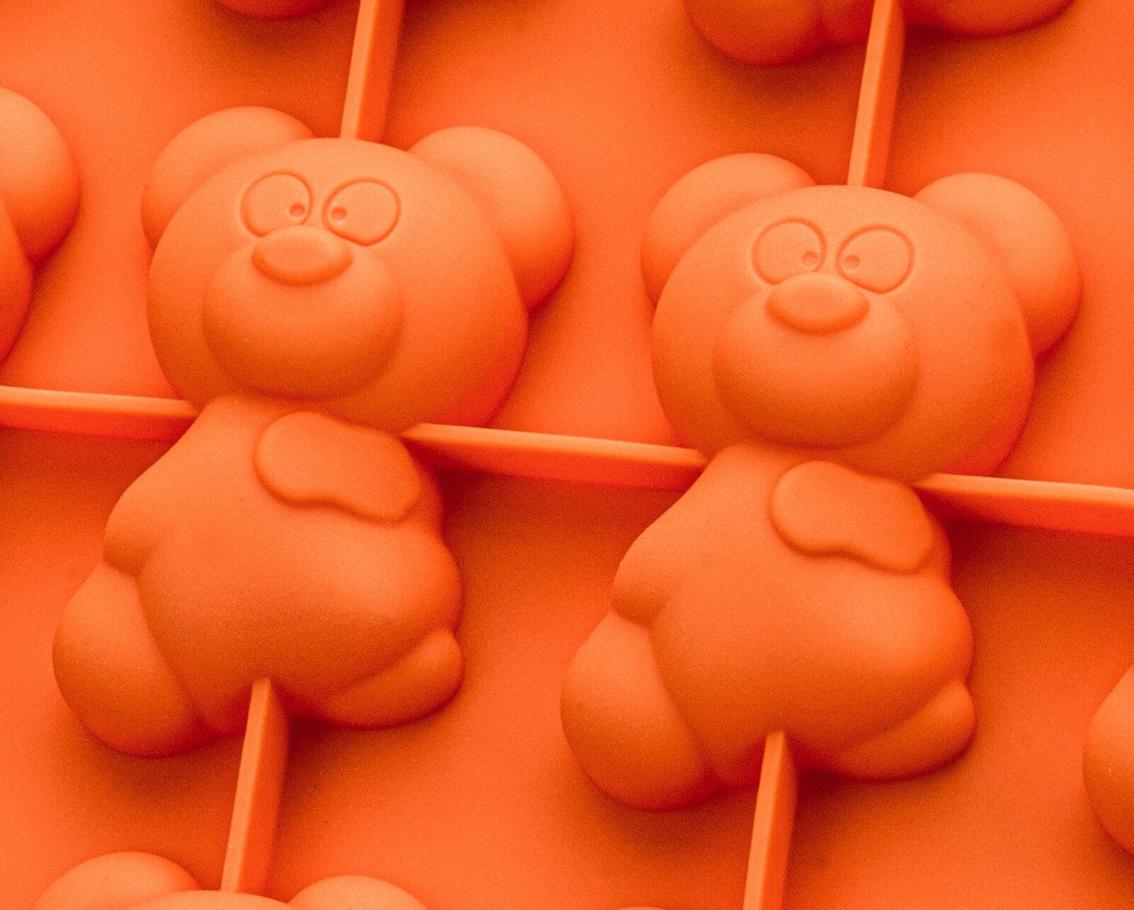 Alt View 1. MOBI - 12 Pigs in a Blanket Silicone Snack Mold, Bear Butts - Orange.