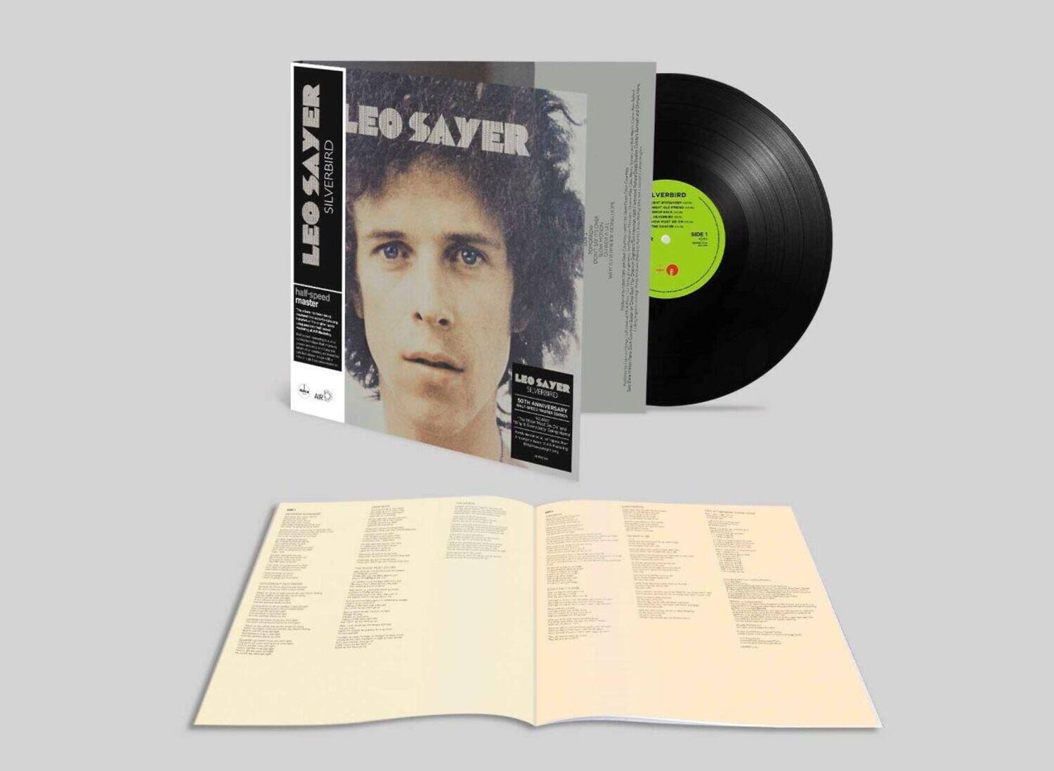 LEO SAYER  
SILVERBIRD  
50TH ANNIVERSARY  
half speed master  

LEO SAYER  
SILVERBIRD  
50TH ANNIVERSARY  

LVERBIRD  
SIDE A  
SIDE B  

[Text on the open booklet is not fully legible, but it appears to be lyrics or detailed information related to the album.]