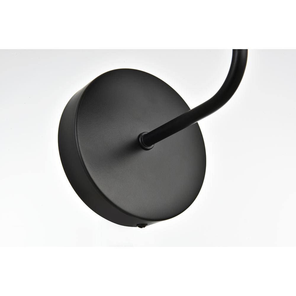 Left. Living District - Genesis 1 light Black and Clear Bath Sconce - Black And Clear.