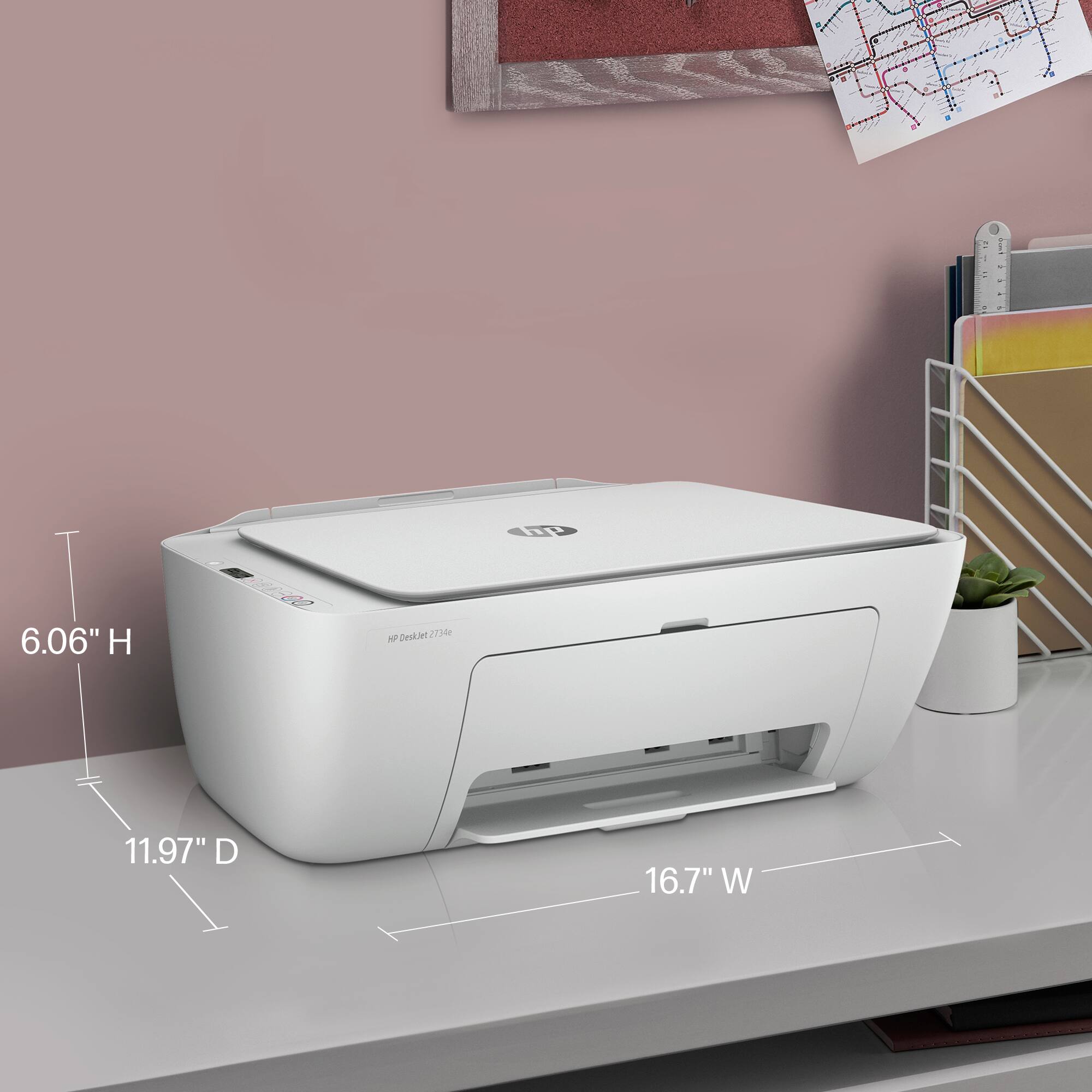The text on the image reads: "0 6.06" H 0 22/ DekNee 2134  11.97" D 16.7" W". This text is describing the dimensions of an object, which is a printer. The dimensions are as follows: 6.06 inches in height, 0 inches in width, and 22 inches in depth. The printer has a width of 11.97 inches and a depth of 16.7 inches.