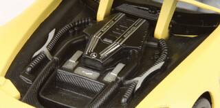 Angle. Motormax - Mercedes Benz SLS AMG GT3 Matte Yellow 1/24 Diecast Model Car by Motormax - Matte Yellow.