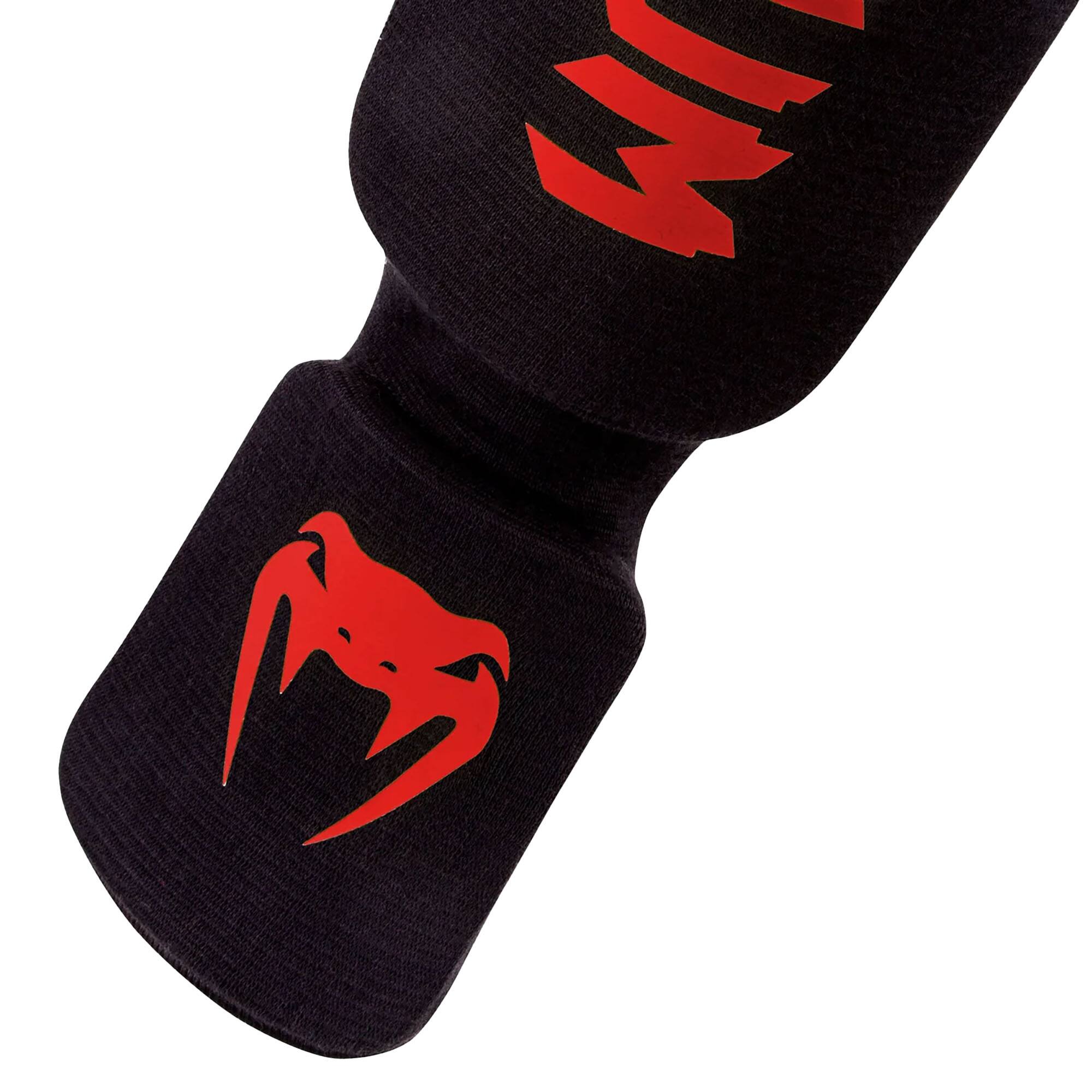 Alt View 5. Venum - Venum Kontact Slip-On Shin And Instep Guards, Black/Red, Medium - Black/Red M.