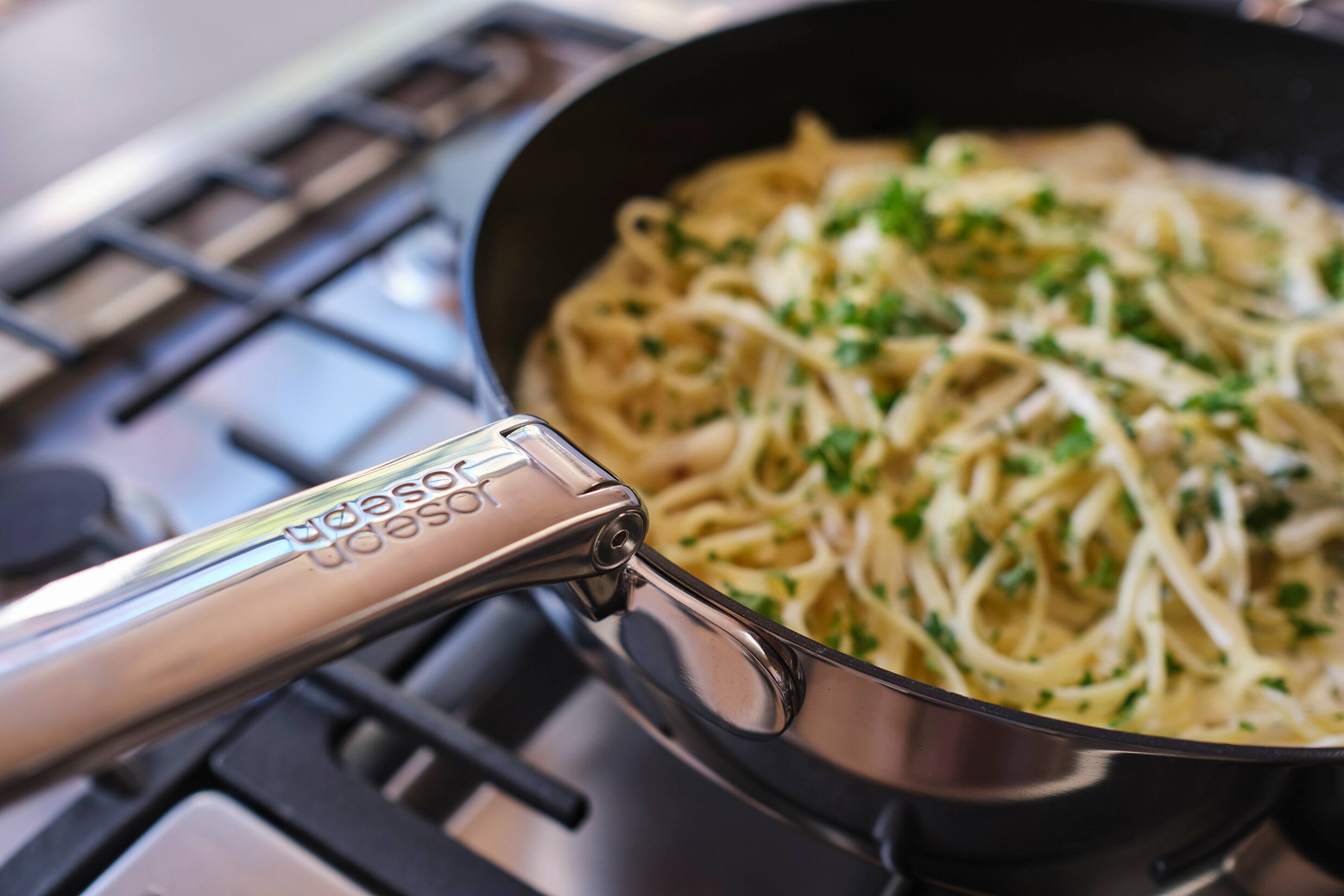 Alt View 4. Joseph Joseph - Space Steel 2-piece Ceramic Non-stick Fry Pan Set with Folding Handles - Stainless Steel.