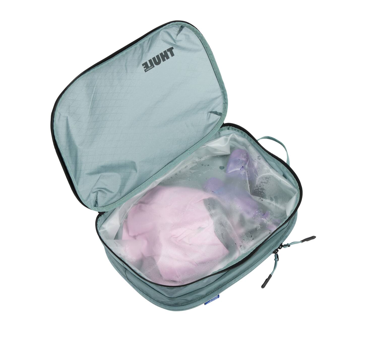 Left. Thule - Compression Packing Cube – Durable Lightweight Travel Organizer for Efficient Packing - Pond Gray.