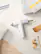 Left. HOTO - EasyFlow Hot Glue Gun, Wireless & Wired Usage, Automatic Dispensing, USB-C Charging, 40 Glue Sticks - White.