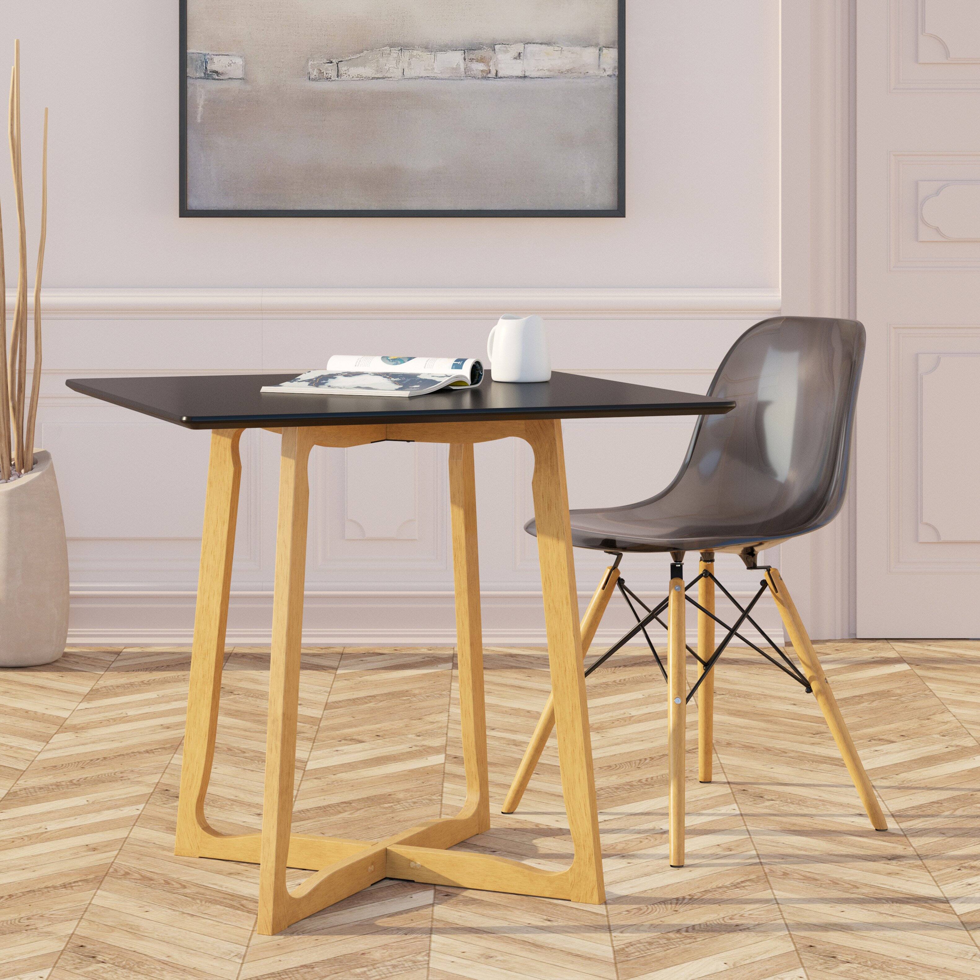 Left. LeisureMod - Dover 4-PCS Modern ABS Plastic Dining Chair - Wood Dowel Legs Accent Chair - Transparent Black.