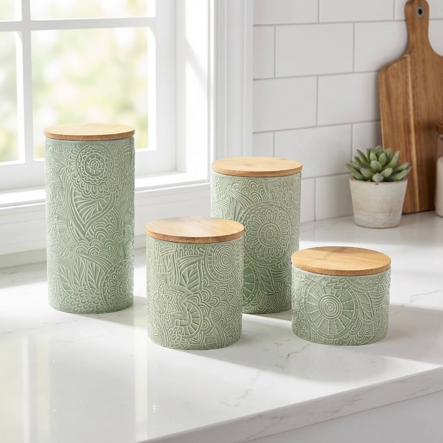 Left. American Atelier - Embossed Sage 4-Piece Kitchen Canister Set.
