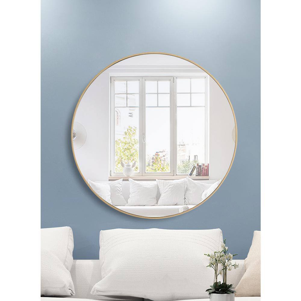 Left. Elegant Decor - Metal frame Round Mirror 42 inch Brass finish - Brass.