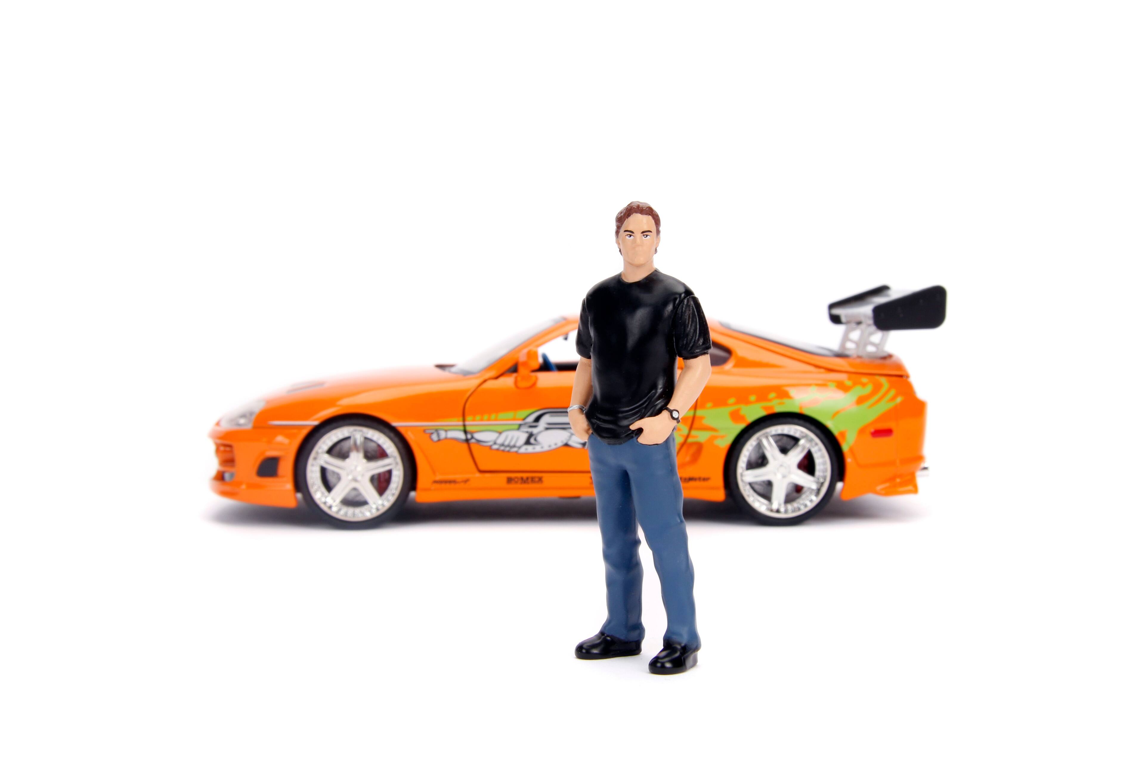 Alt View 3. Jada - Toyota Supra Orange Metallic with Brian Diecast Figurine "Fast & Furious" Movie 1/24 Diecast Model Car by Jada.