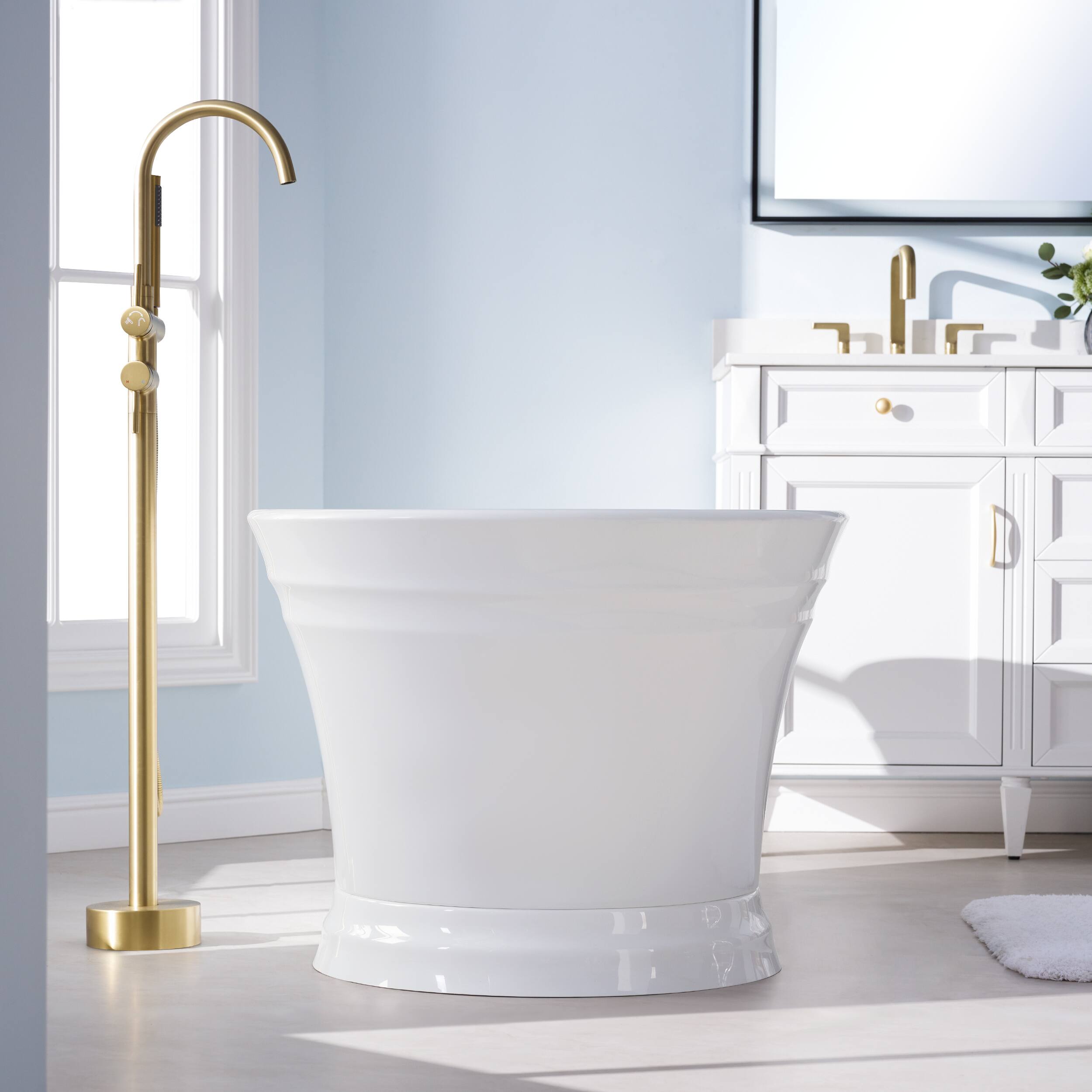Left. WELLFOR - Elio 59 in. x 31 in. Pure Virgin Acrylic Oval Freestanding Soaking Bathtub with Drain and Overflow - White.