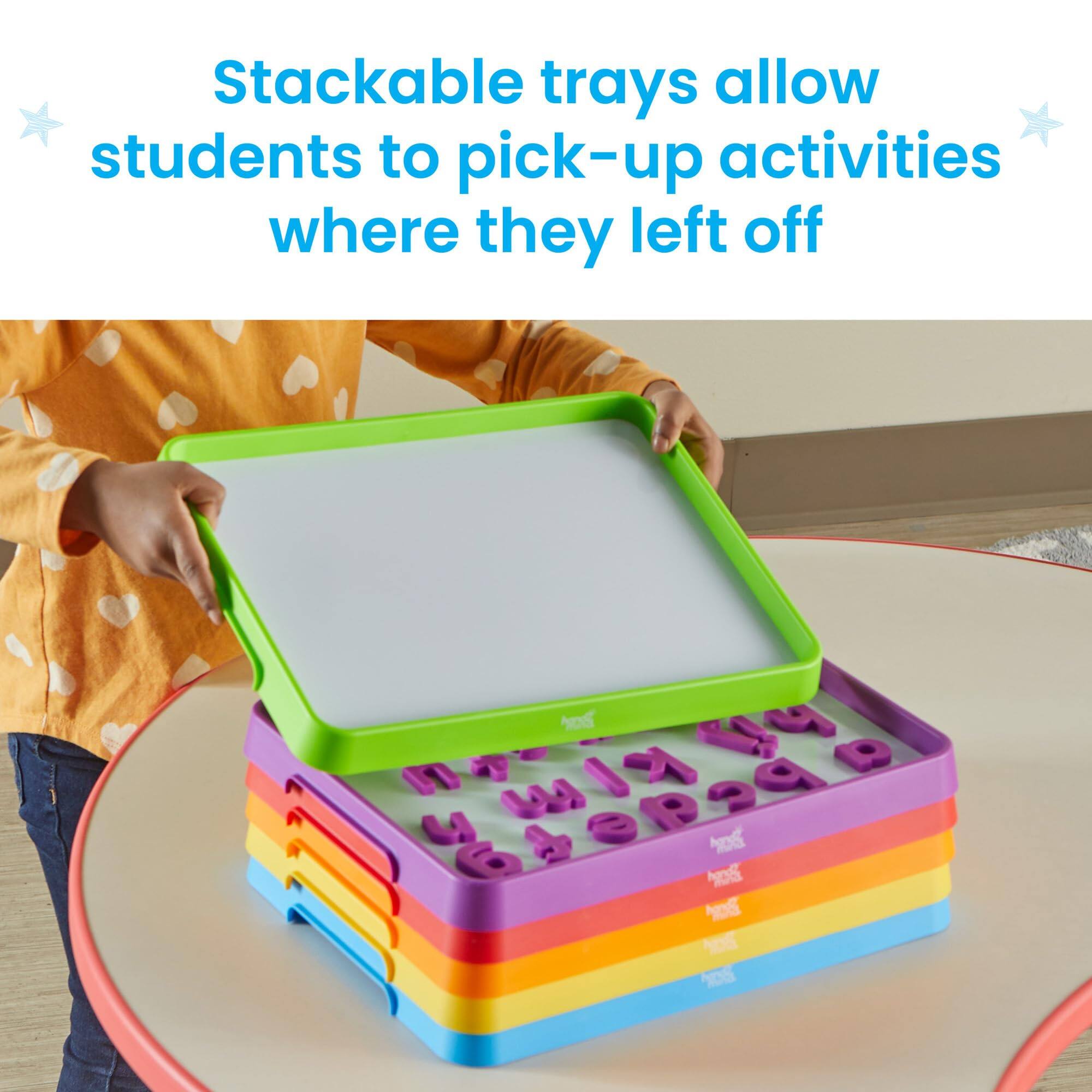 Stackable trays allow students to pick-up activities where they left off