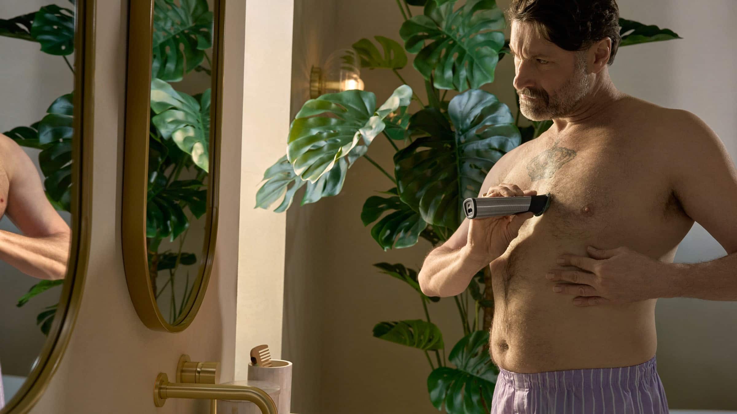 Left. Philips Norelco - Philips Norelco All-in-One 9000 Series 23-Piece Trimmer - MG9575/49 - Silver.