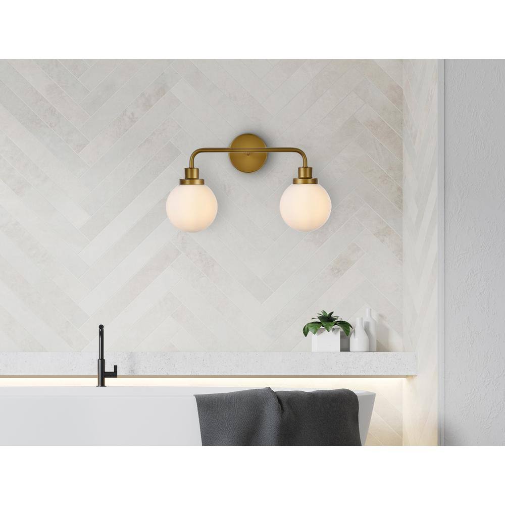 Angle. Living District - Hanson 2 lights bath sconce in brass with frosted shade - Brass And Frosted Shade.
