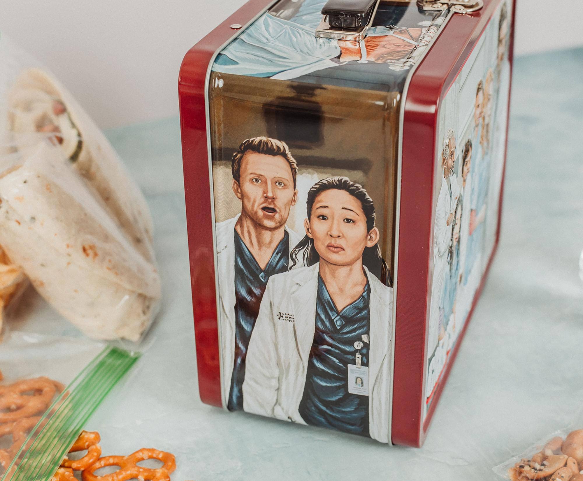 Alt View 3. Toynk - Grey's Anatomy Cast Metal Tin Lunch Box Tote | 8 x 7 x 4 Inches - Red.