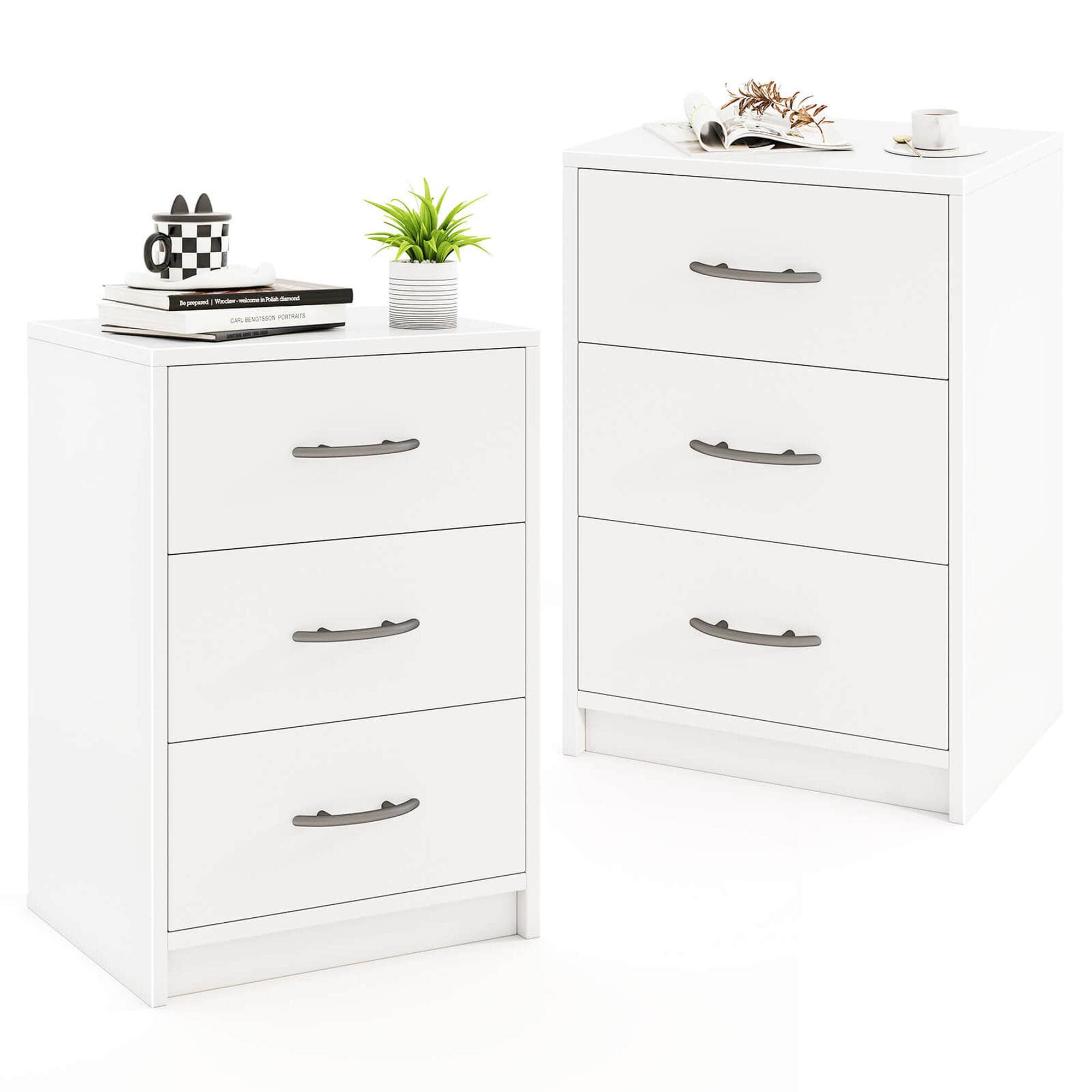 The image shows two white dressers with drawers, placed next to each other. On top of the dressers, there are various items such as a potted plant, a book, a cup, and a vase. The potted plant is located on the left dresser, while the book, cup, and vase are placed on the right dresser. The dressers are neatly arranged, creating a visually appealing and organized space.