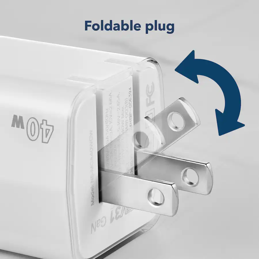 El texto de la imagen dice "Enchufe plegable M 40 . 65A. AFC 5A50/60HZ GOHz 15V=2 5-16V=2,65A. Máx. 2,5 A. MB-003(B) NMB 24H19P-006394 HIA V8=A6 9 2A Vietriama NS-MCA40WCW 6-240V SV-3A 20V-2A 5.11V24 21V2A CES-003(B) S en 5 ICES G de Modelo: V/31 GaN."