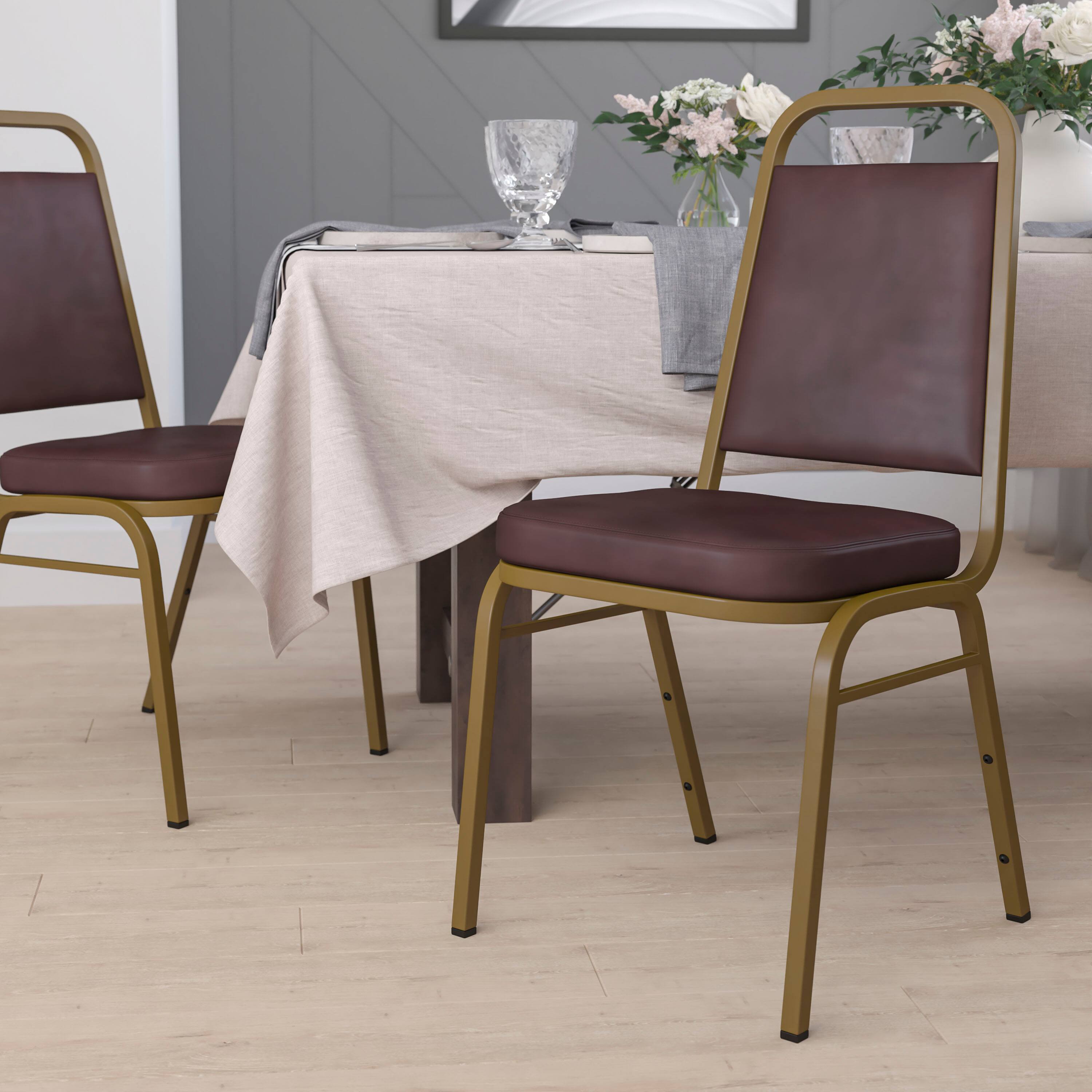 Alt View 1. Emma + Oliver - Trapezoidal Back Stacking Banquet Dining Chair - 2.5" Thick Seat - Brown Vinyl/Gold Frame.