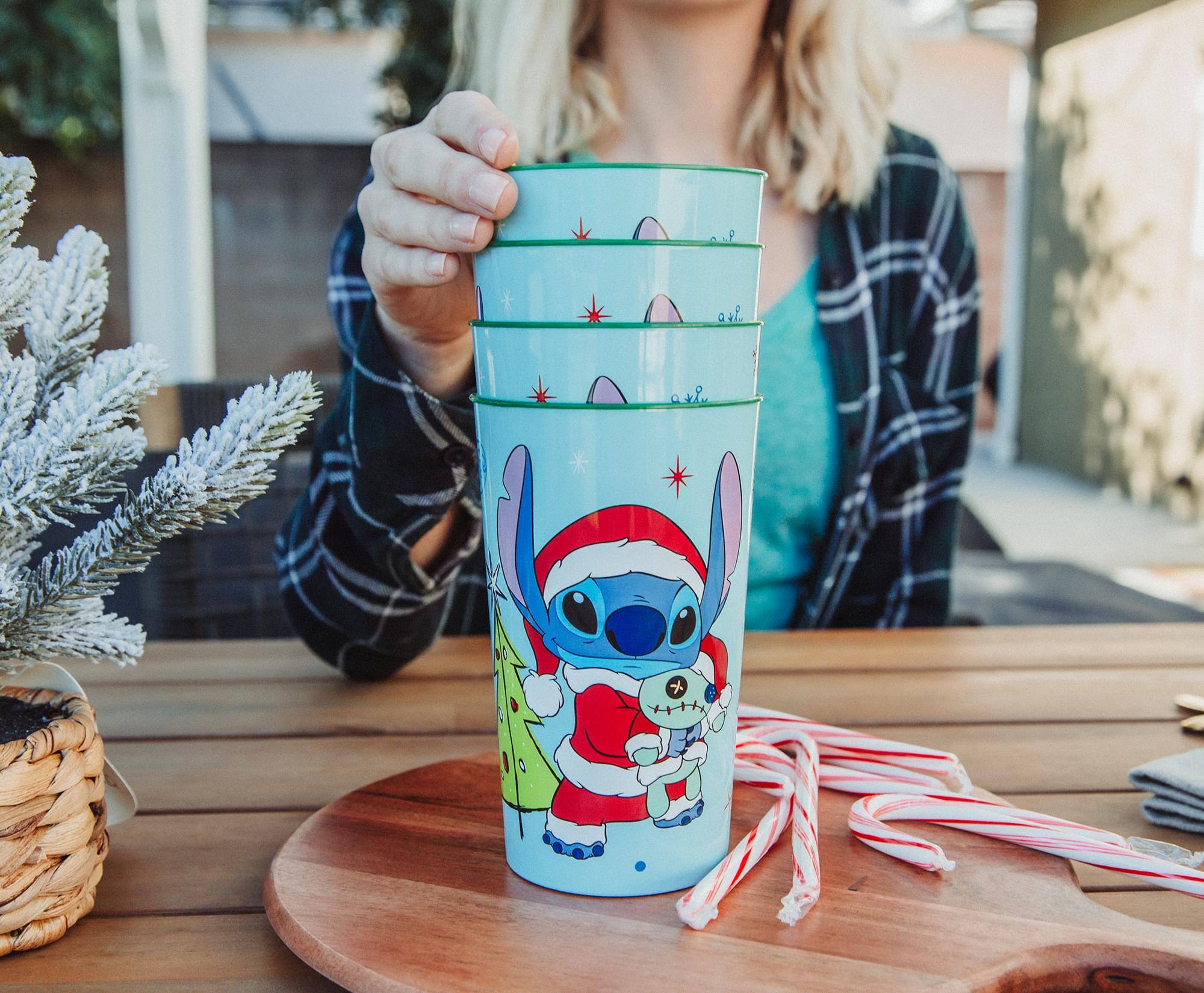 Alt View 5. Silver Buffalo - Disney Lilo & Stitch Santa Stitch 4-Piece Plastic Cup Set | Each Holds 22 Ounces - Blue.