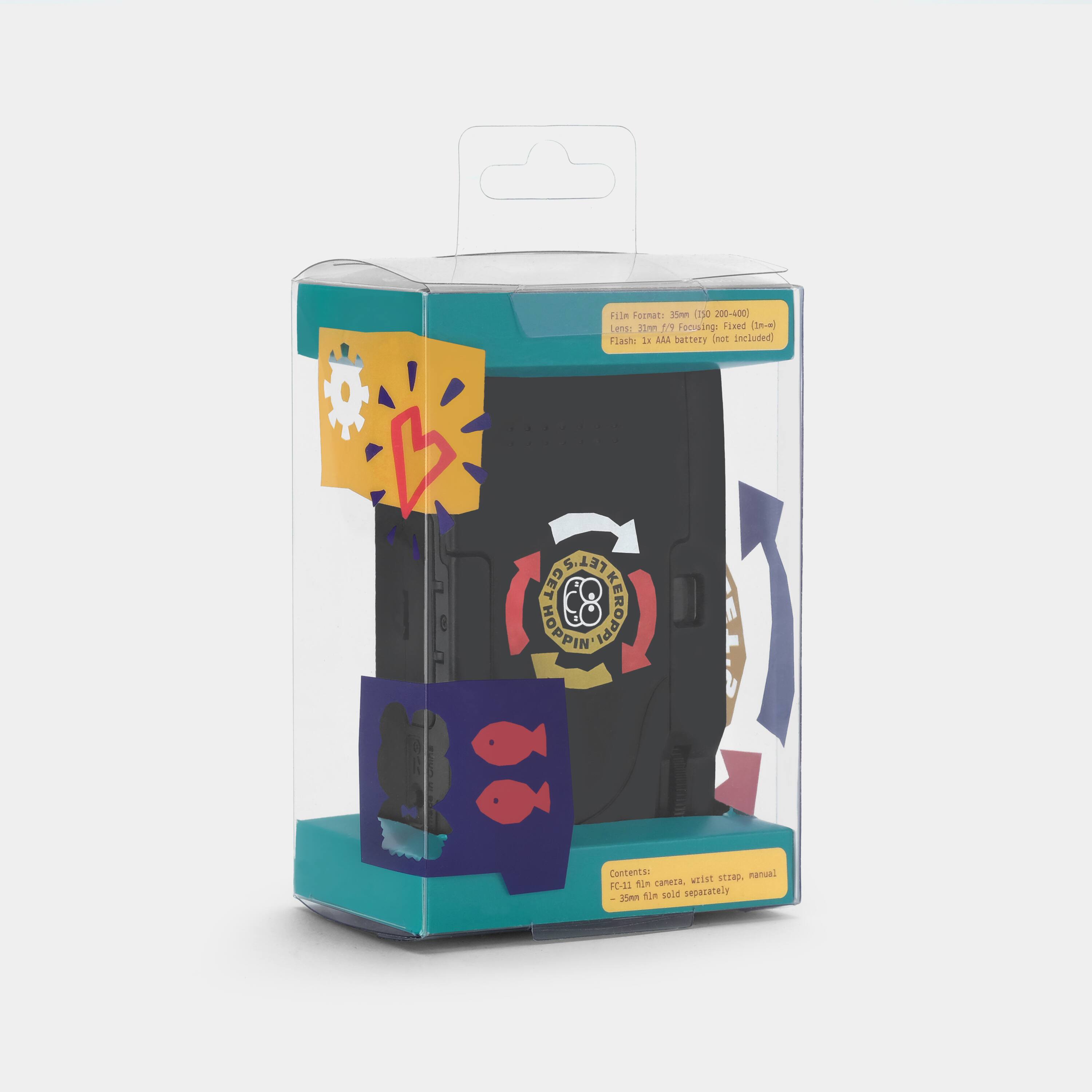 Hin FOTRAt: 35mm  
200-400  
Lens: 31mm f/9  
Flash: 1x AA battery included  
Content:  
- Film camera  
- Wrist strap  
- Manual  
- 35mm film sold separately  

Film Format: 35mm (ISO 200-400)  
Lens: 31mm f/9 (reusing film)  
Flash: 1x AA battery (not included)  

CET 1983  
KEROPPY HOPPIN'  
1983