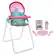 It's a baby alive high chair with a pink seat and a green and pink blanket. The high chair is accompanied by a baby alive box, a baby alive fork, a baby alive spoon, a baby alive bottle, and a baby alive plate.