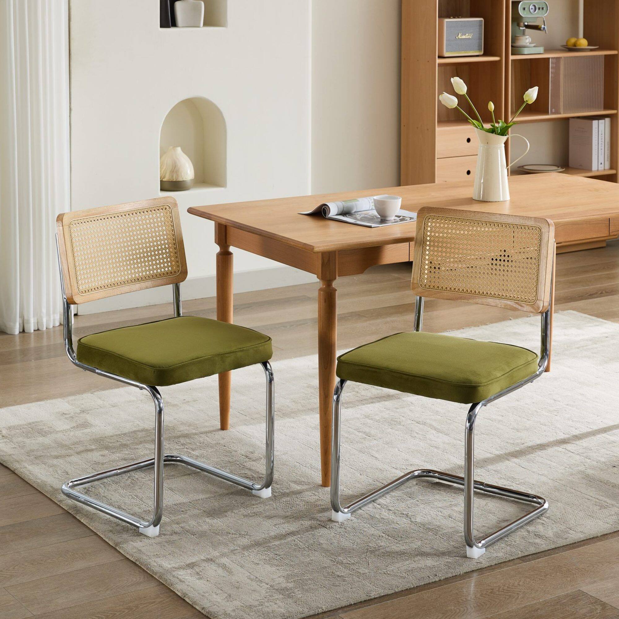 Angle. GOODSILO - Mid Century Modern Dining Chairs Set of Two with Velvet Upholstery and Cane Back - Olive Green.