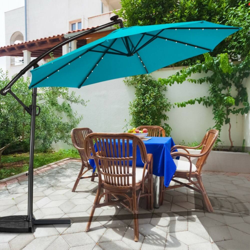 Left. Mondawe - 10 Feet Solar Powered LED Patio Offset Umbrella 360° Rotation (Base not includ) - Turquoise.