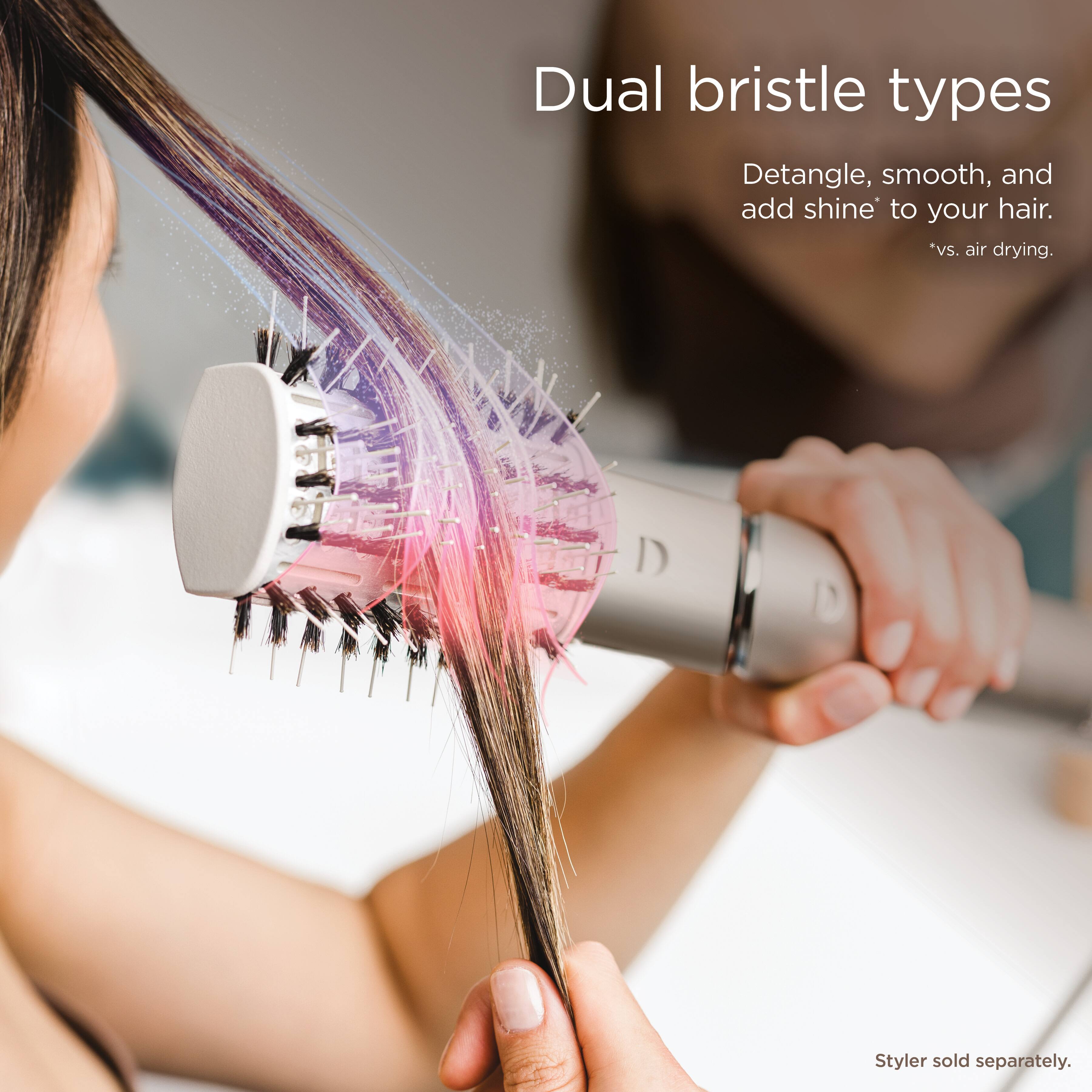 Dual bristle types  
Detangle, smooth, and add shine* to your hair.  
*vs. air drying.  
Styler sold separately.