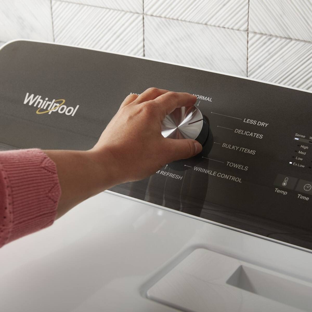 Whirlpool

NORMAL  
LESS DRY  
DELICATES  
BULKY ITEMS  
TOWELS  
WRINKLE CONTROL  
REFRESH  

Sense  
High  
Med  
Low  
ExLow  

Temp  
Time