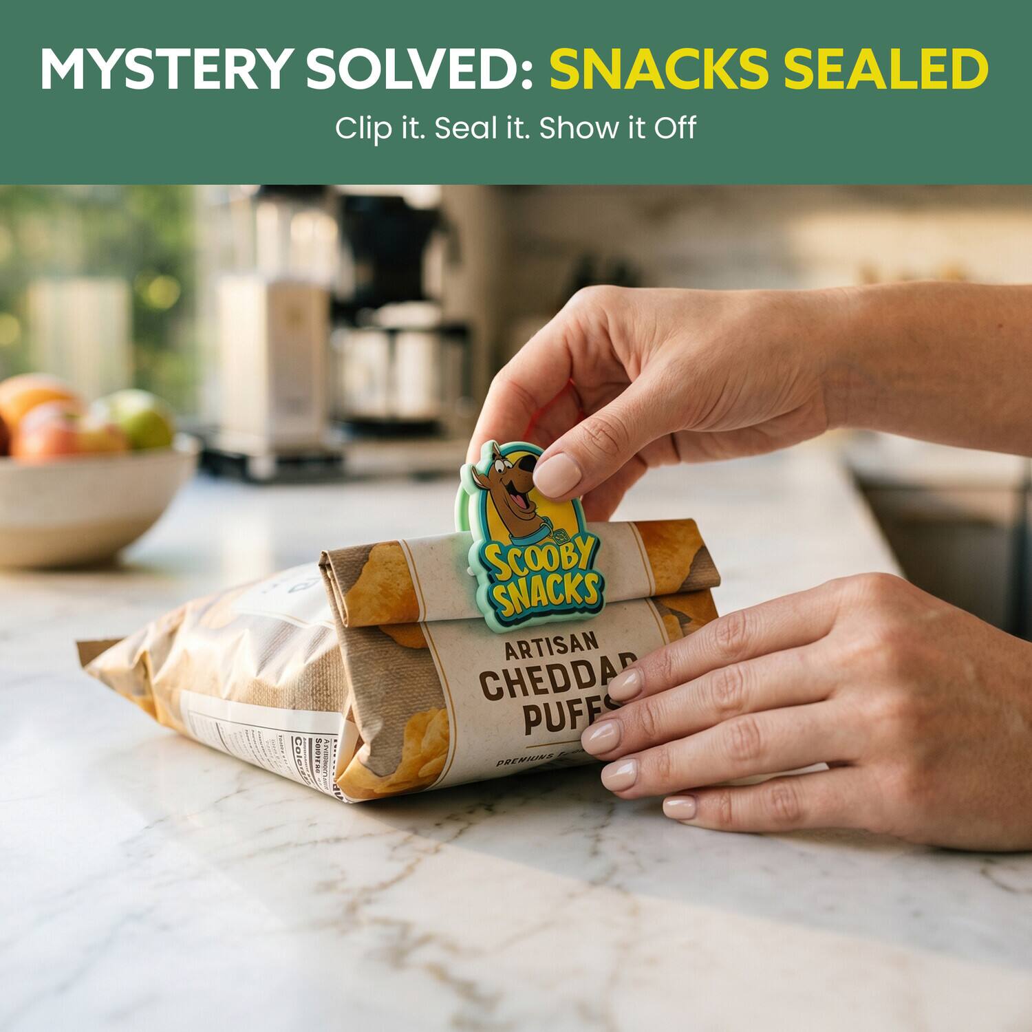 MYSTERY SOLVED: SNACKS SEALED  
Clip it. Seal it. Show it Off  

SCOOBY SNACKS  
ARTISAN CHEDDAR PUFF