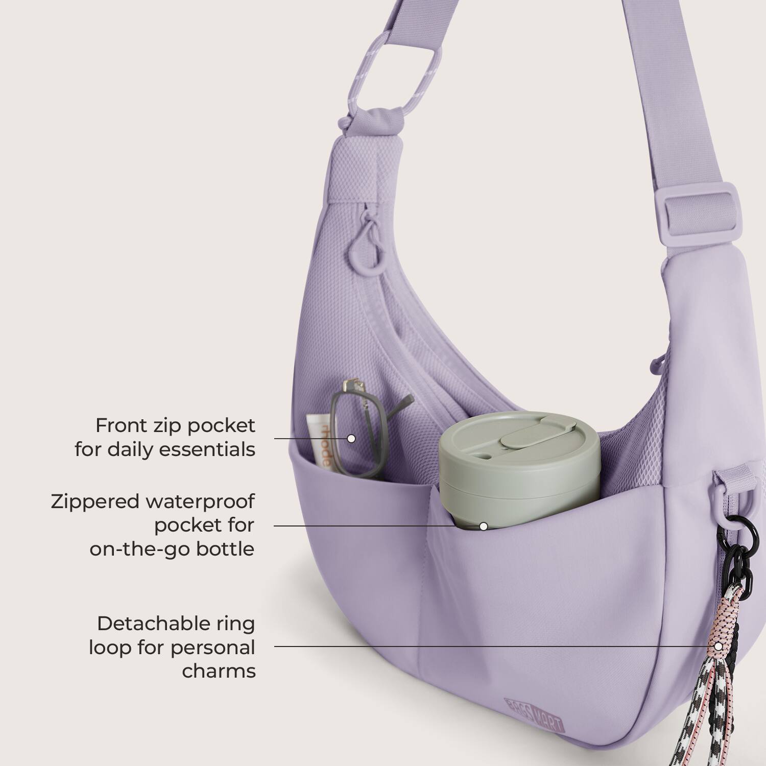 Front zip pocket for daily essentials  
Zippered waterproof pocket for on-the-go bottle  
Detachable ring loop for personal charms