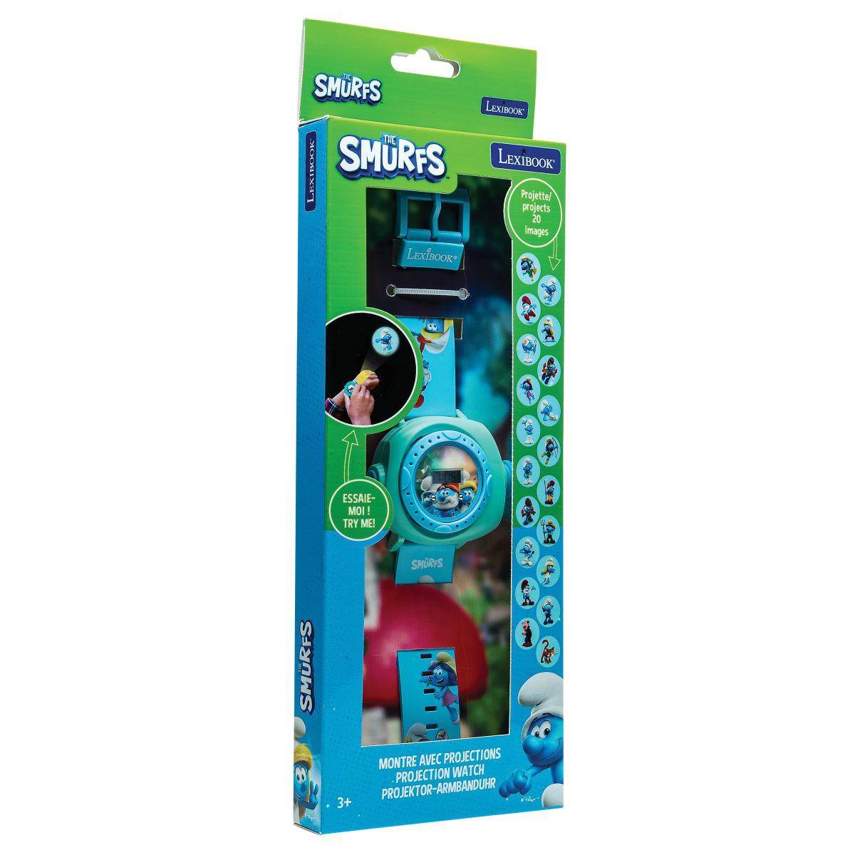 SMURFS LEXIBOOK  
SMURFS LEXIBOOK  
Projette/Projects 20 images  
LuxTBOOK  
ESSAIE-MOI!  
TRY ME!  
MONTRE AVEC PROJECTIONS  
PROJECTION WATCH  
PROJEKTOR-ARMBANDUHR  
3+