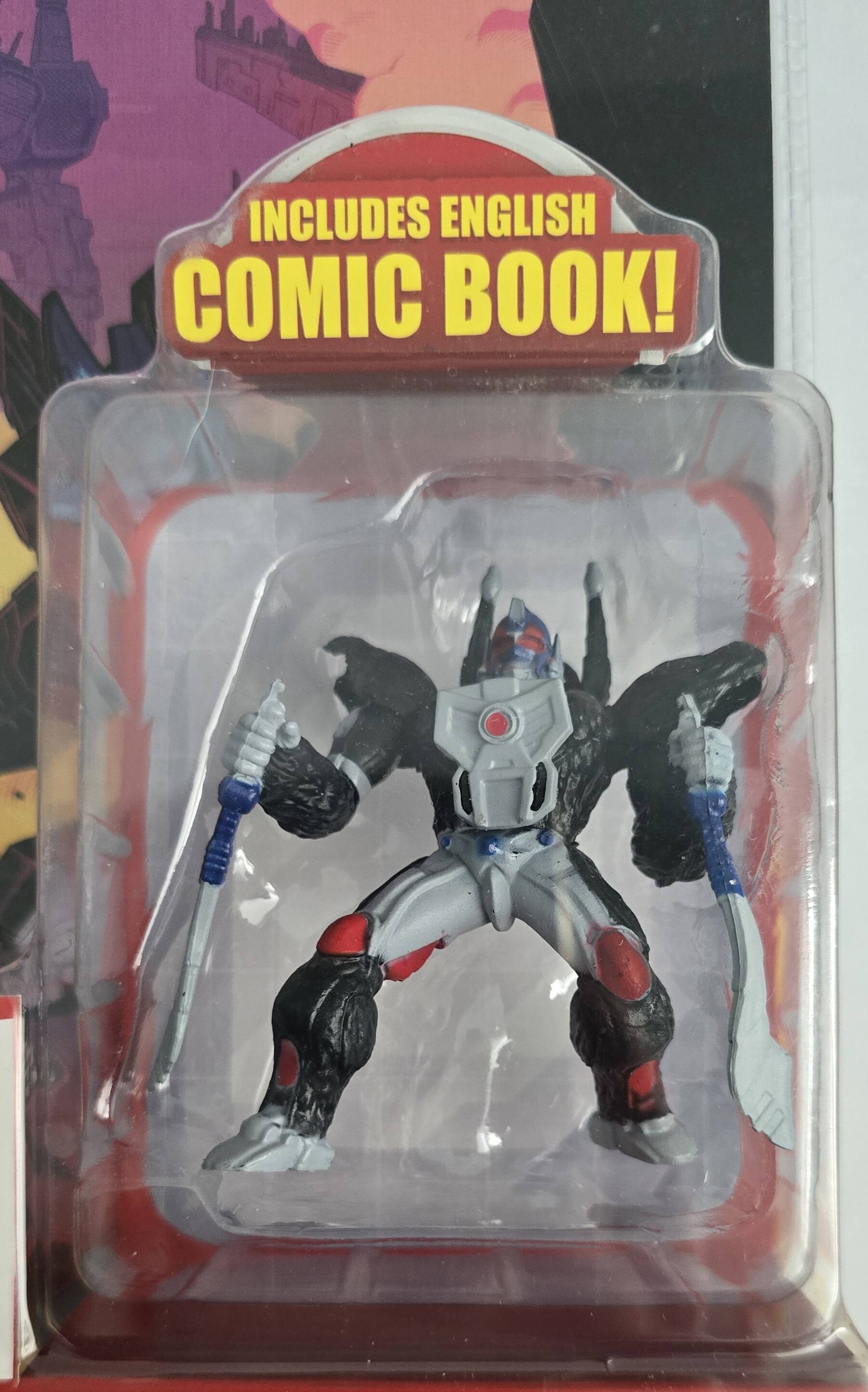 The text on the image reads: "INCLUDES ENGLISH COMIC BOOK!"