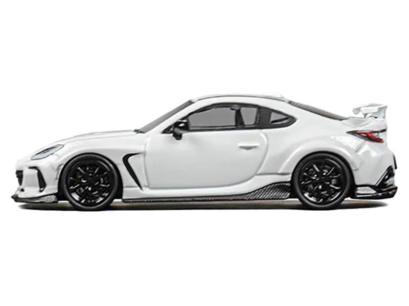 Left. CM Models - Subaru BRZ "Varis Arising-1" RHD (Right Hand Drive) White with Extra Wheels 1/64 Diecast Model Car by CM Model - White .