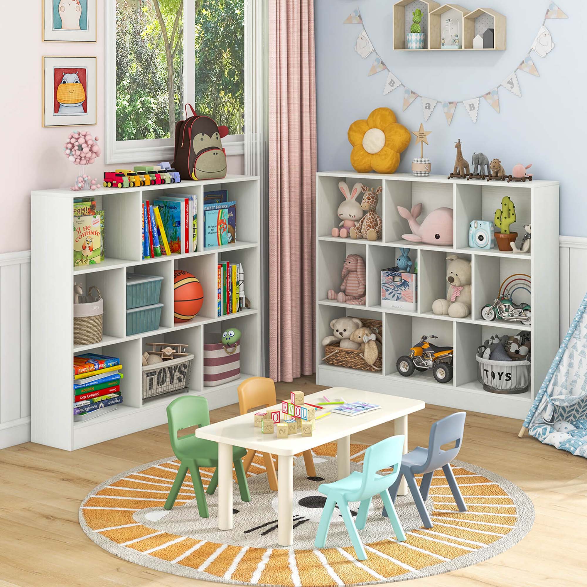 A child's room with a table and chairs, a bookshelf filled with books, and a window. The bookshelf is also filled with toys, including a sports ball, a teddy bear, and a toy car. The room is decorated with a pink wall, a rug, and a table with chairs. The room also has a play table with toys and a window view.