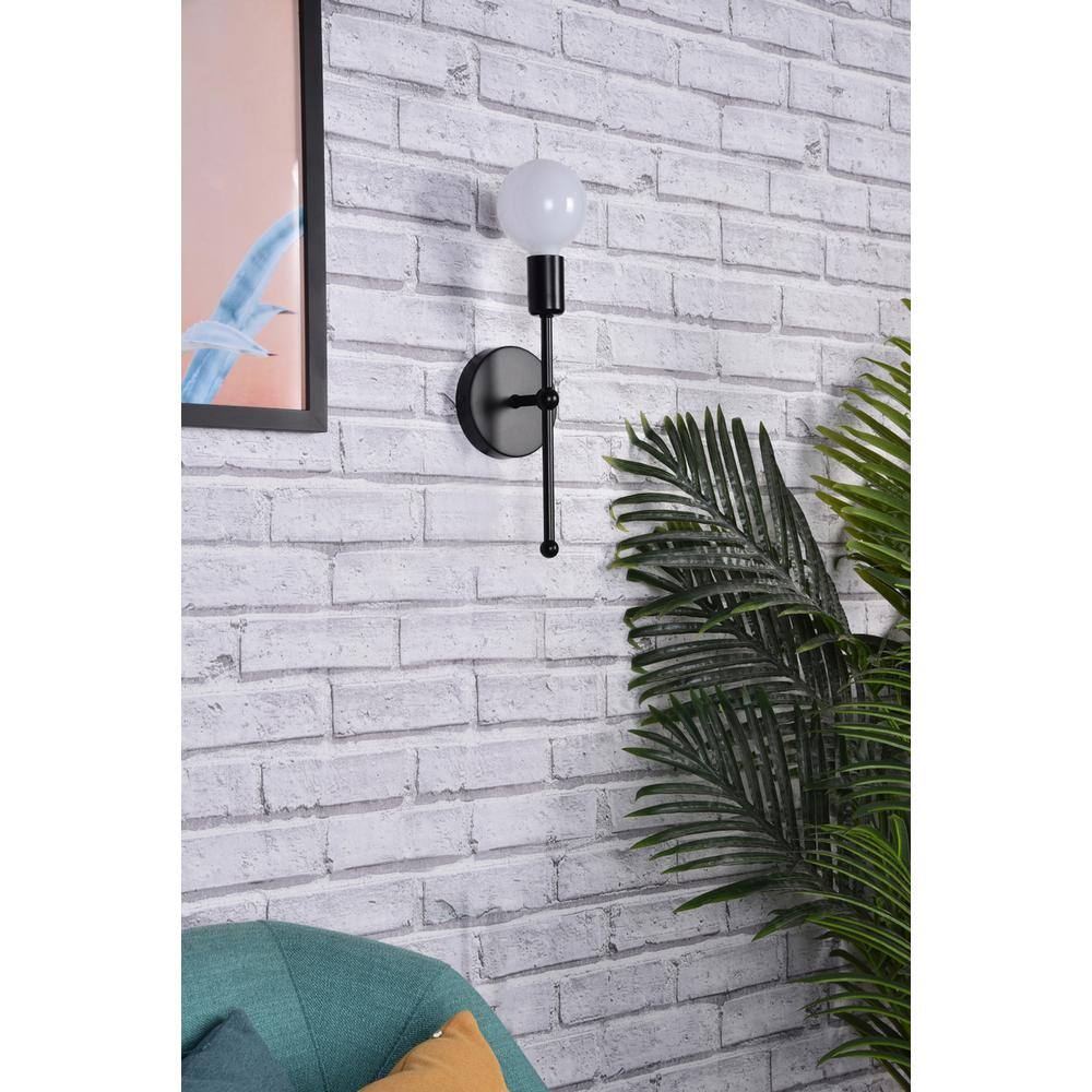 Left. Living District - Keely 1 light black wall sconce - Black.