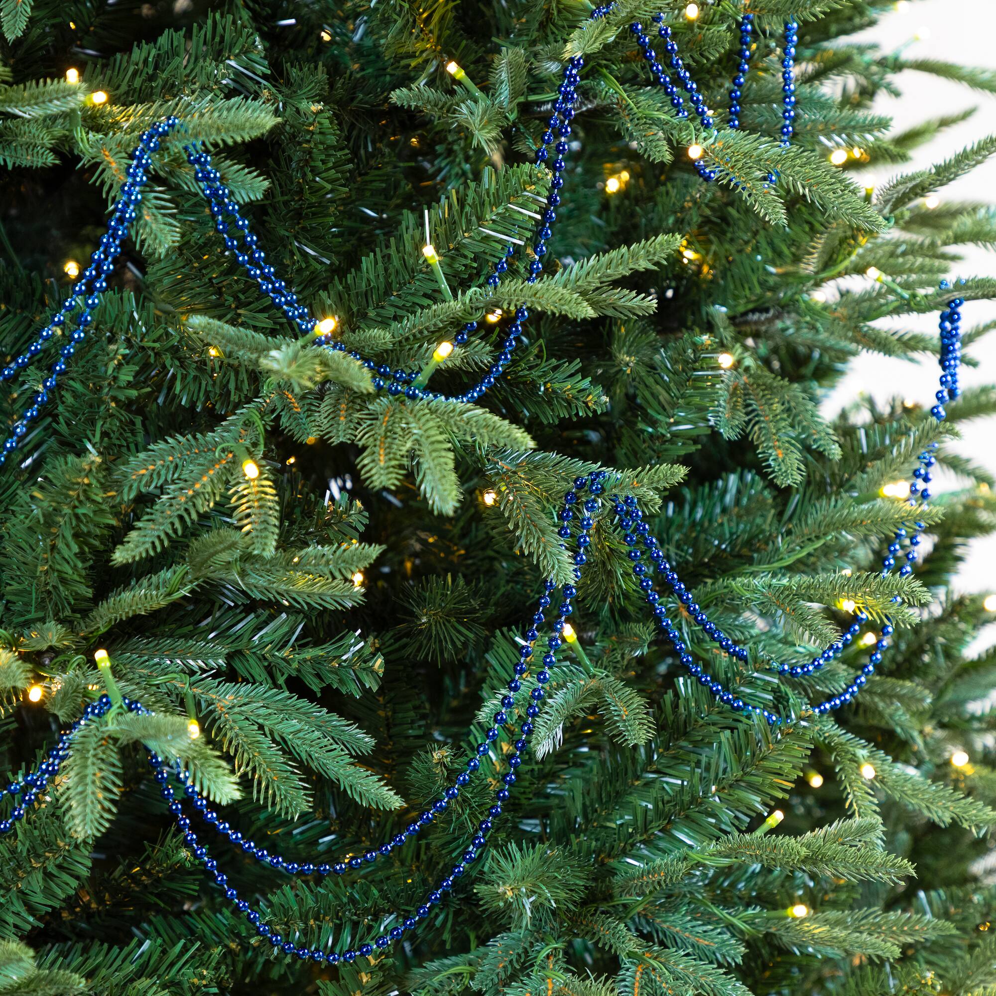 Front. Northlight - Shiny Beaded Christmas Garland -15' x .25" - Sapphire Blue - Unlit - Blue.