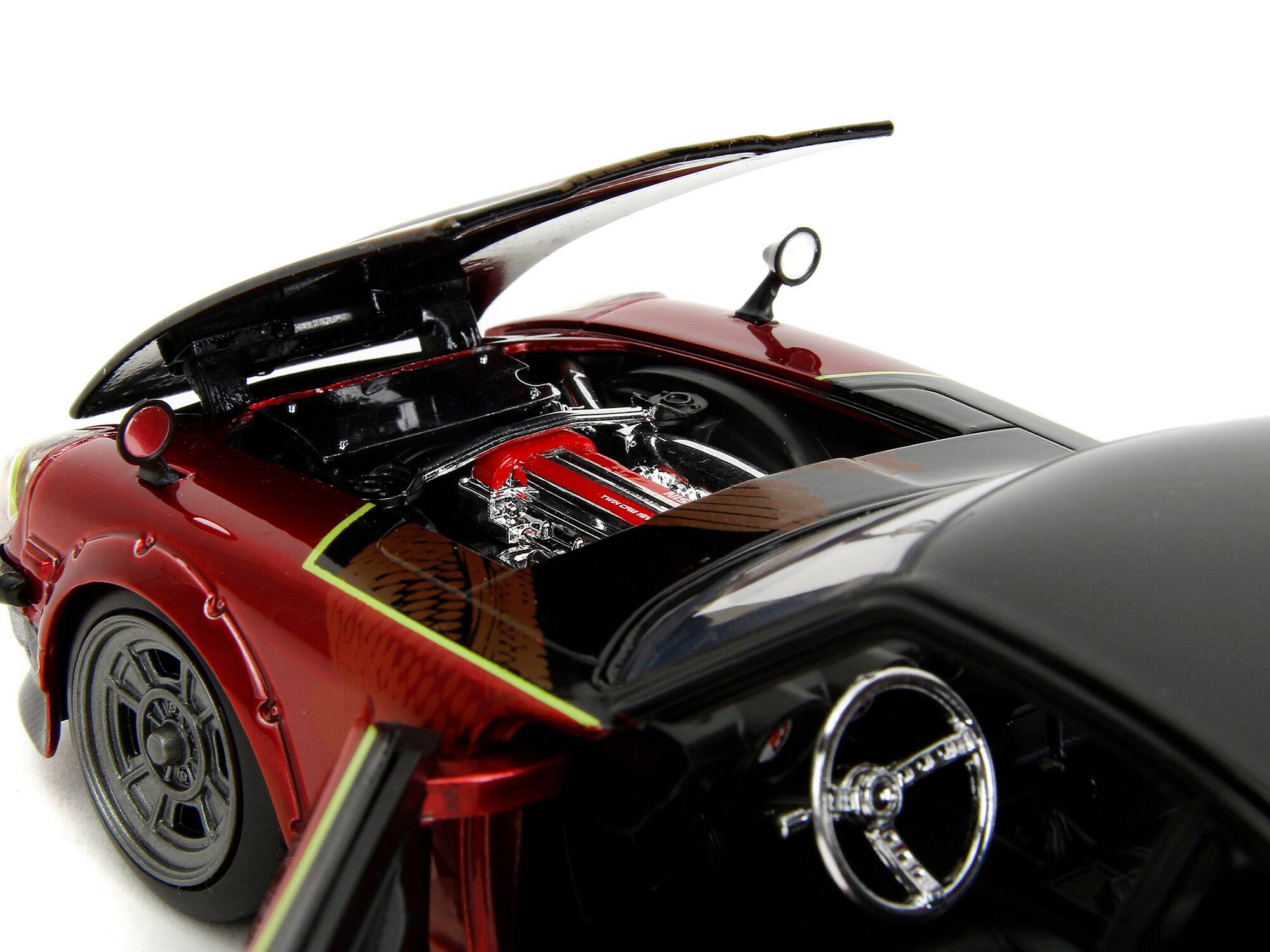 Left. Jada - 1972 Datsun 240Z Black and Red Metallic with Graphics "Fast X" (2023) Movie "Fast & Furious" Series 1/24 - Black And Red Metallic.